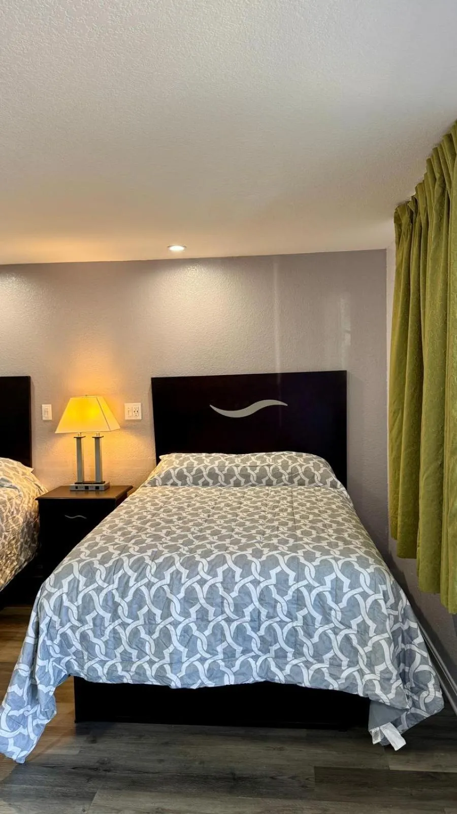 Bed in Chisholm's Motor Inn