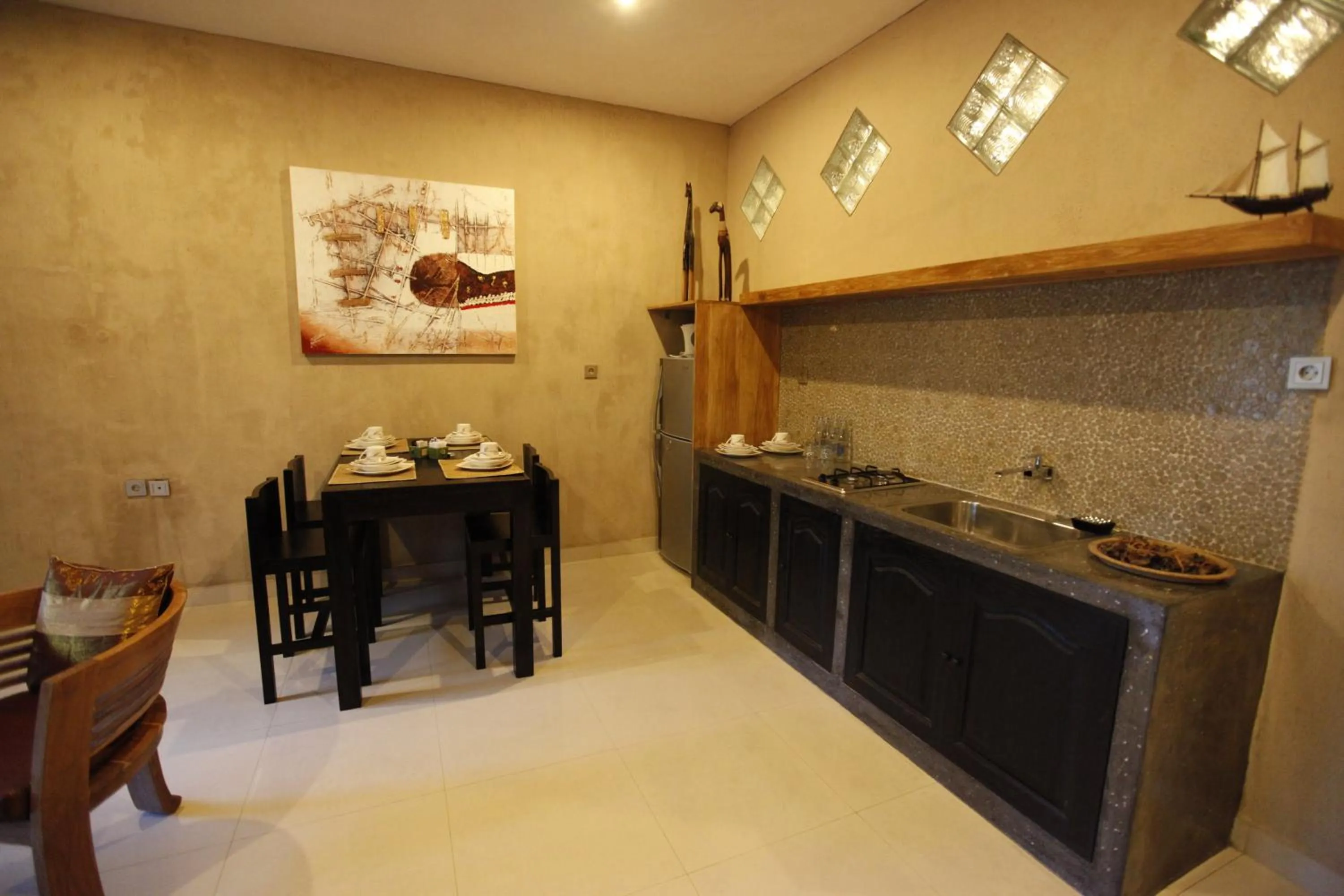 Kitchen or kitchenette in Puri Dajuma Beach Eco-Resort & Spa