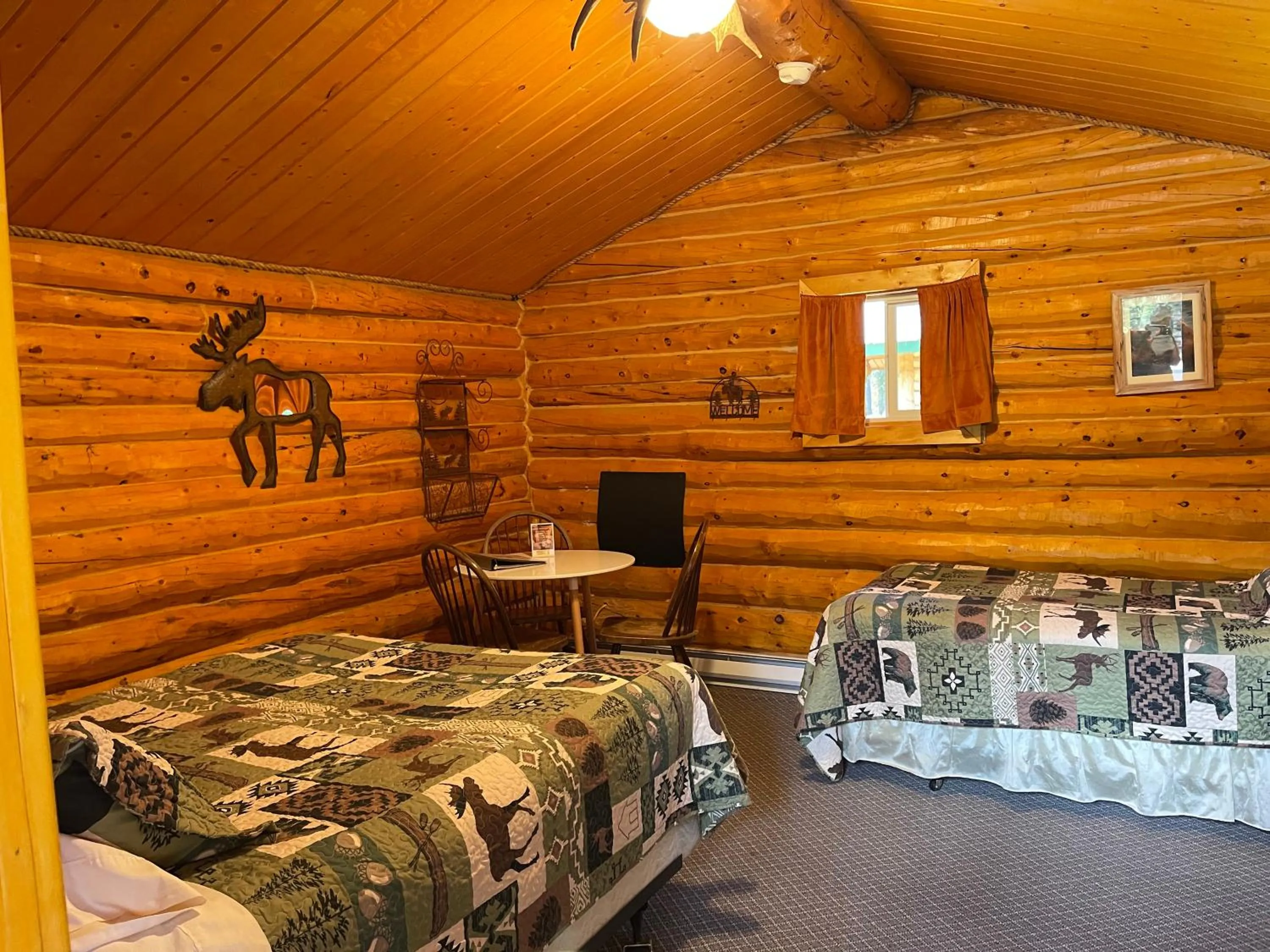Photo of the whole room, Bed in Carlo Creek Cabins