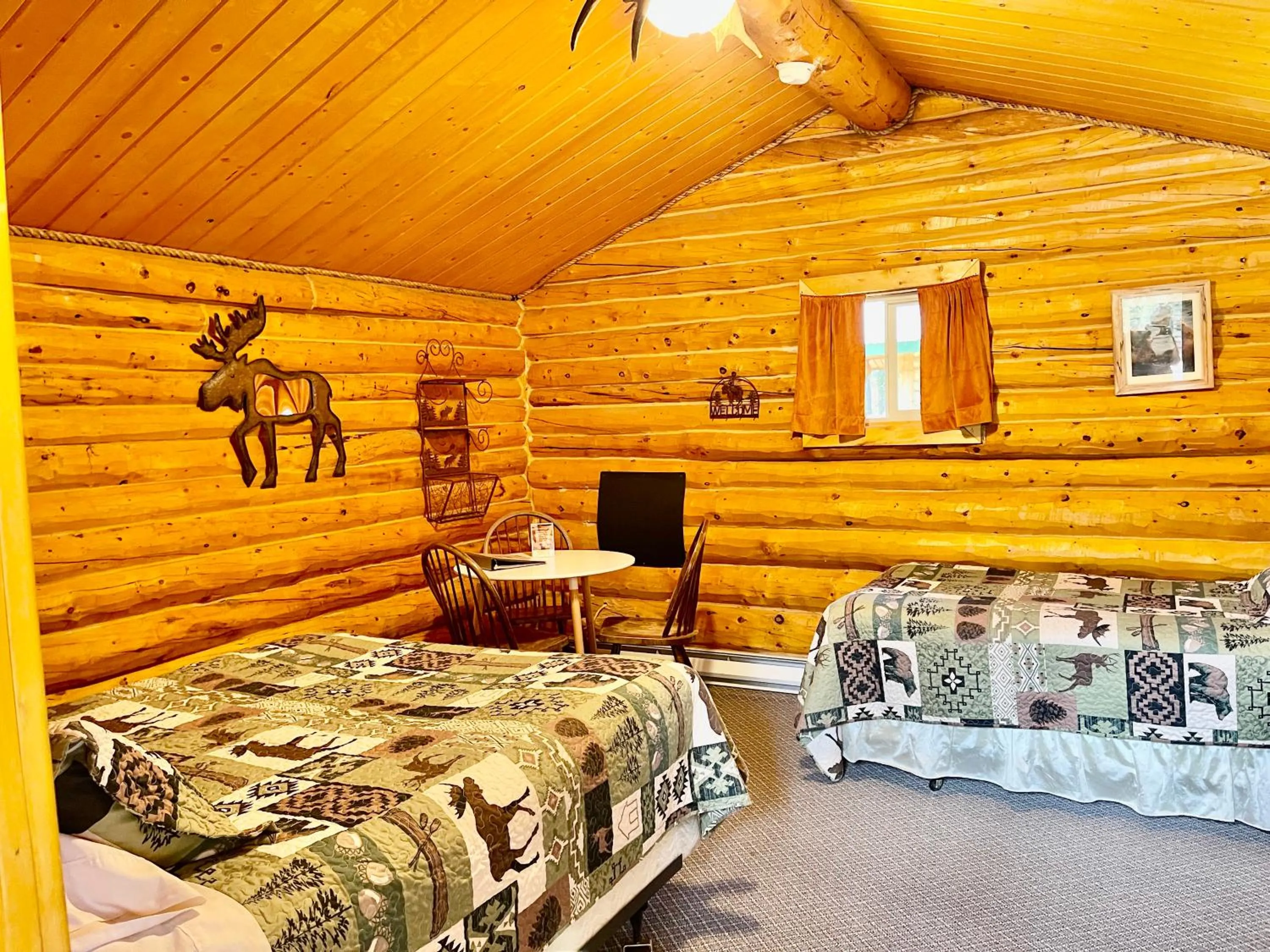 Bed in Carlo Creek Cabins