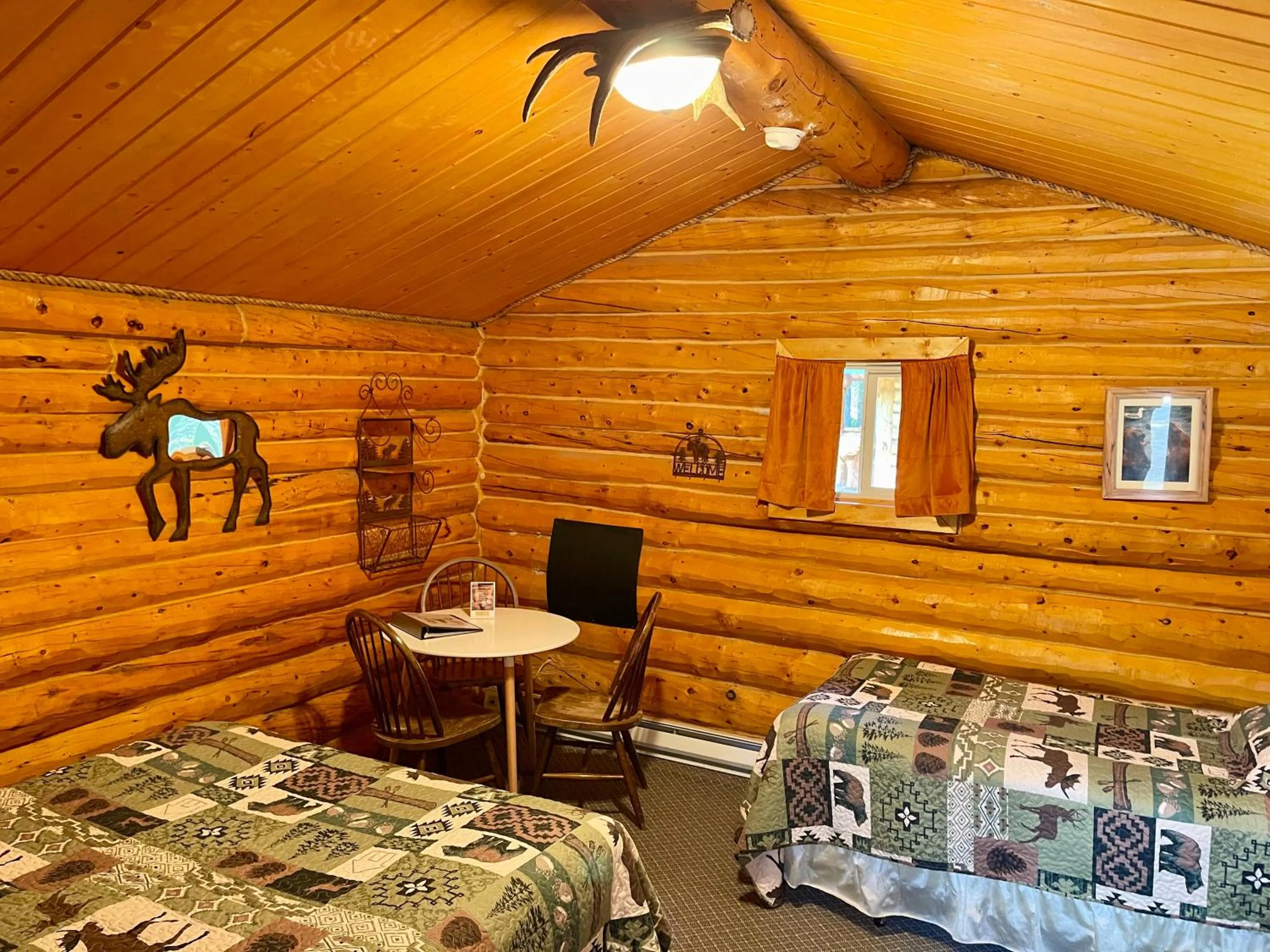 Photo of the whole room, Bed in Carlo Creek Cabins