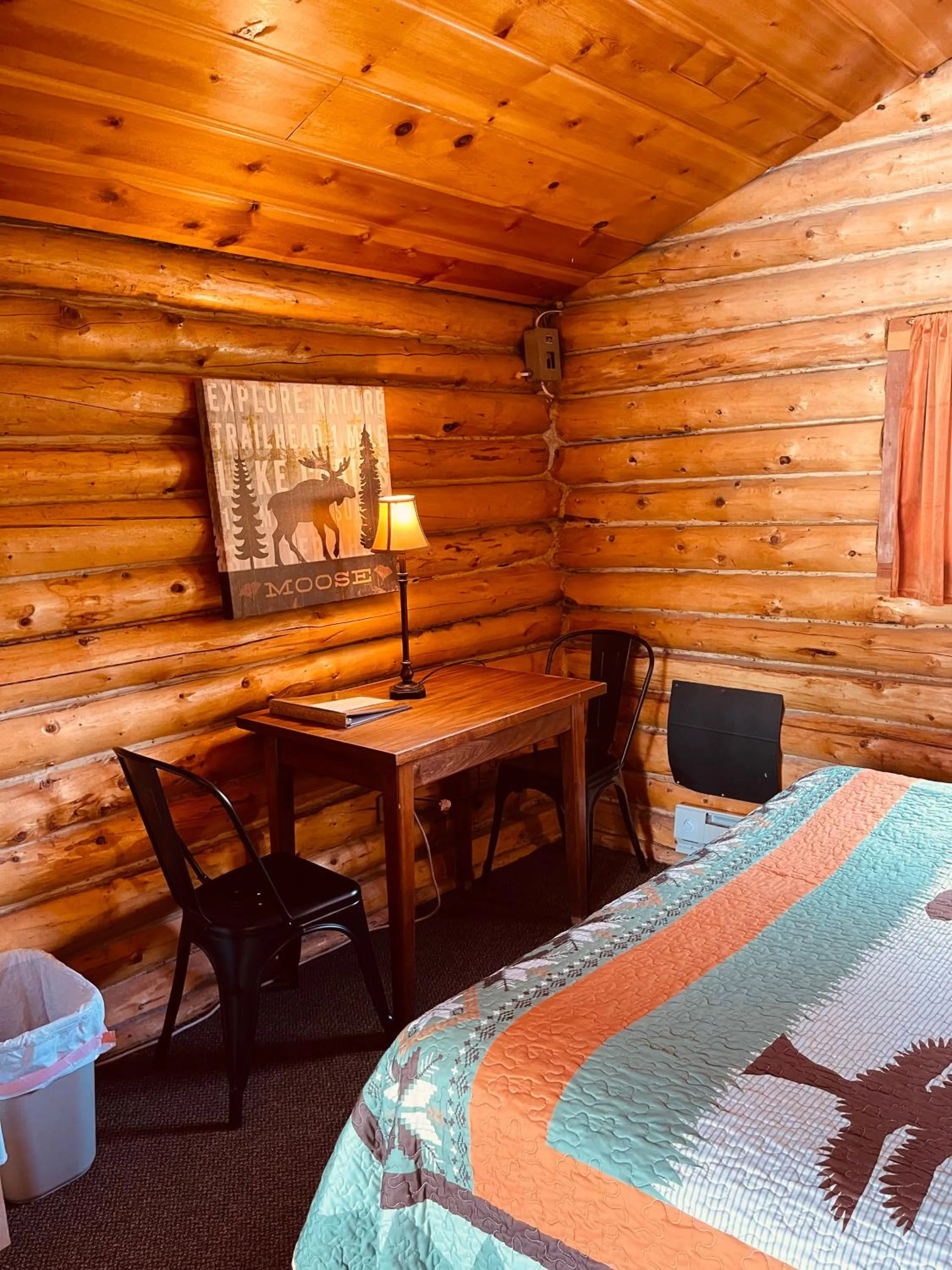 Bed in Carlo Creek Cabins