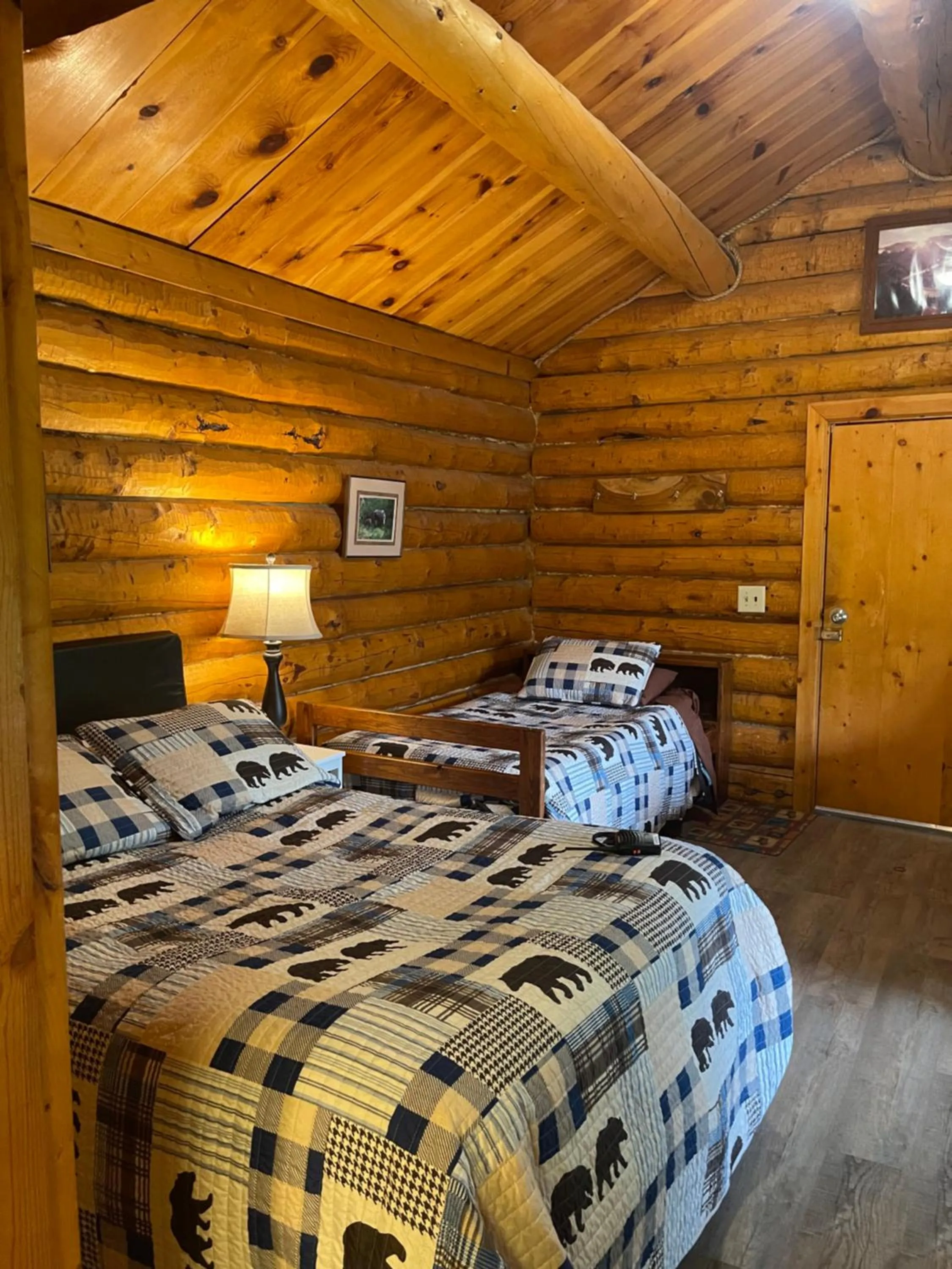 Bed in Carlo Creek Cabins