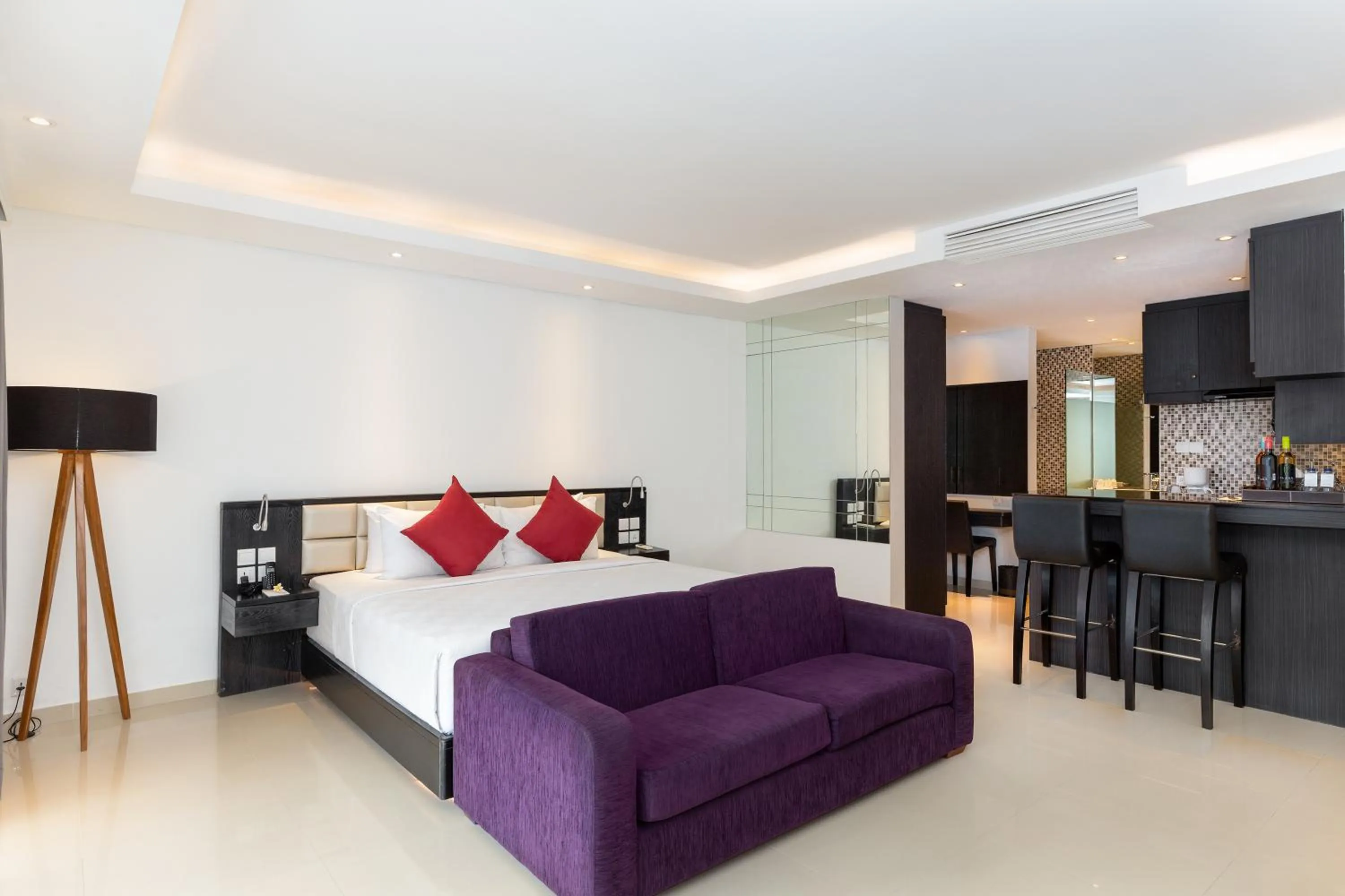 Seating area, Bed in Downtown Villas