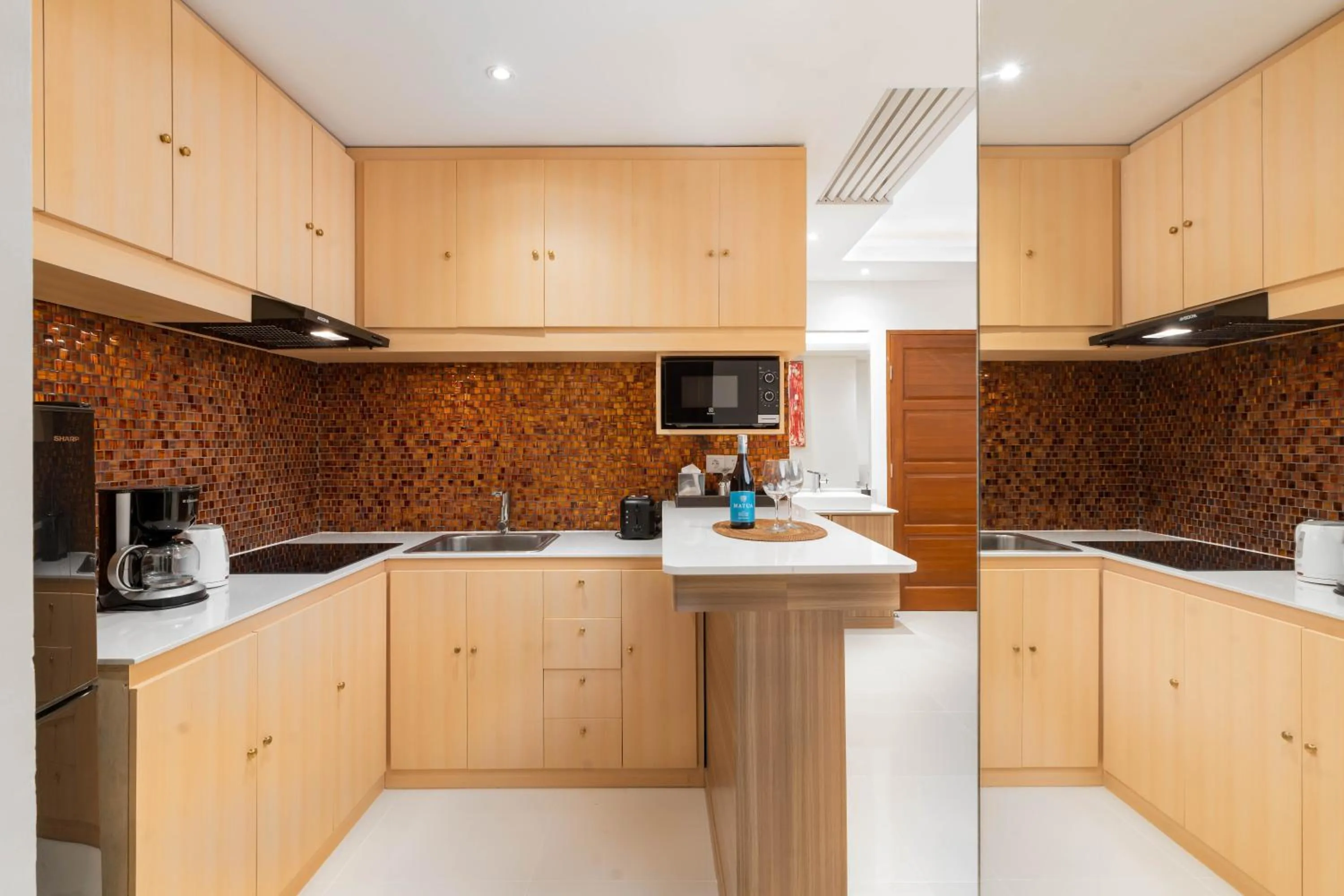 Kitchen or kitchenette in Downtown Villas