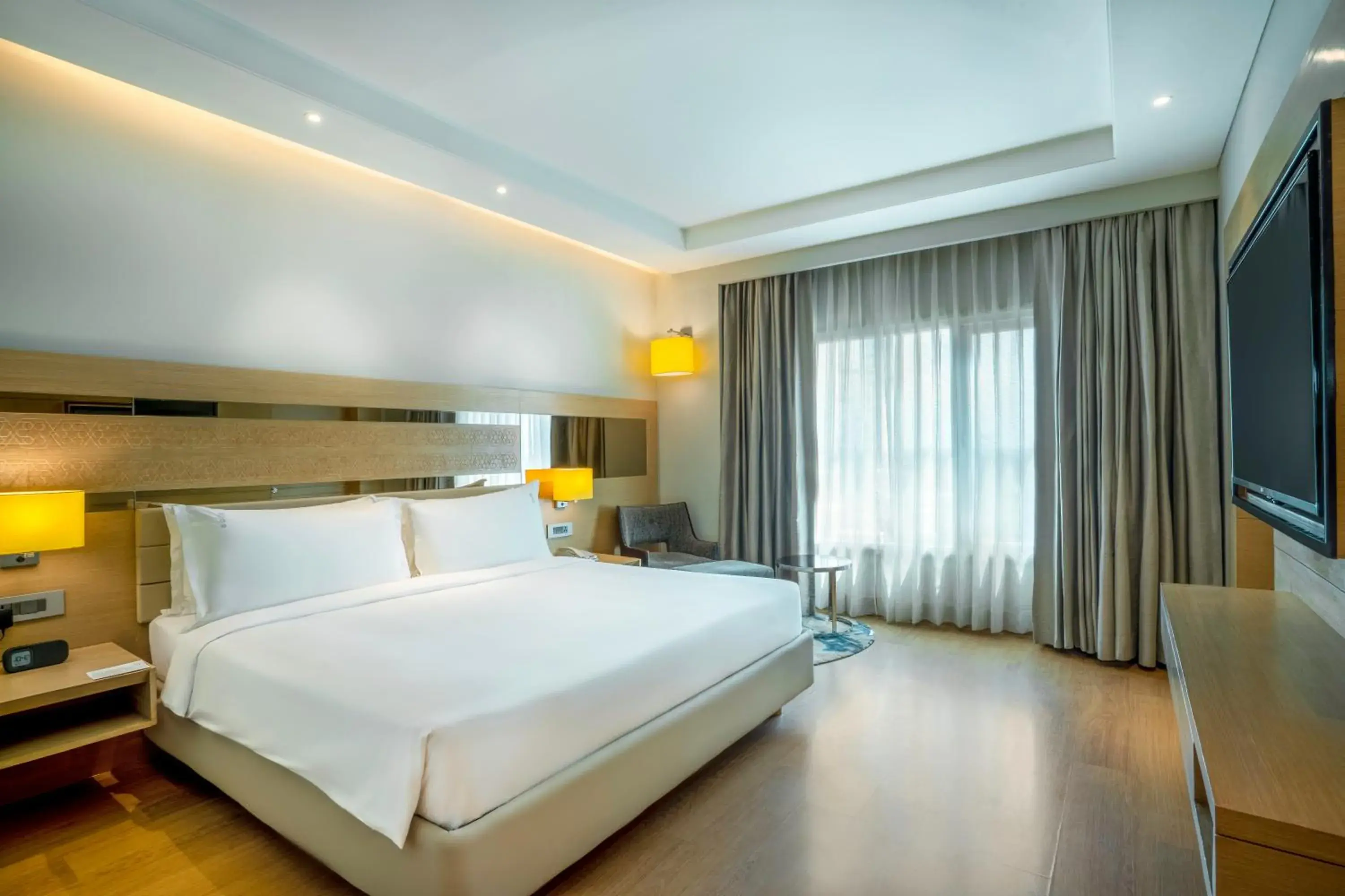 Bedroom, Bed in Holiday Inn Agra MG Road an IHG Hotel Bedroom, Bed in Holiday Inn Agra MG Road an IHG Hotel