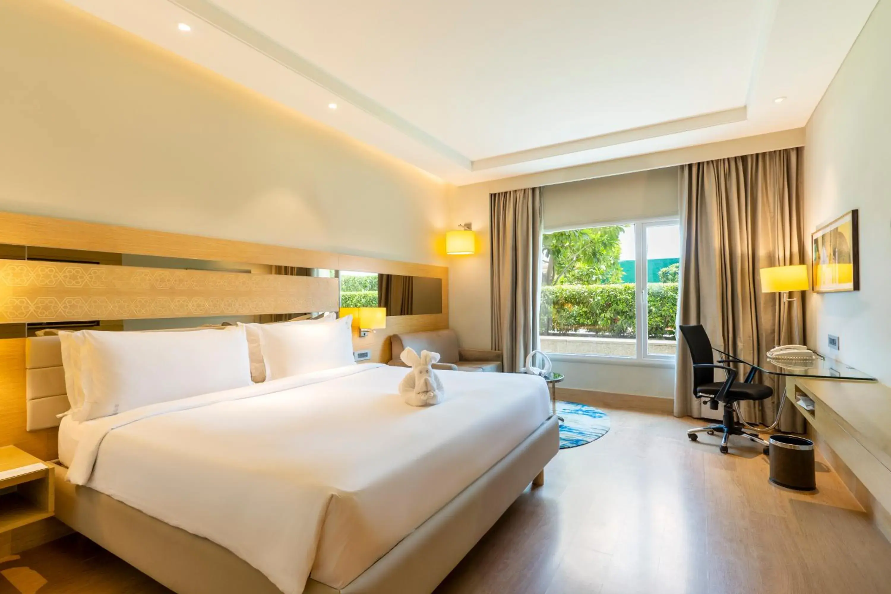 Garden view, Bed in Holiday Inn Agra MG Road an IHG Hotel Garden view, Bed in Holiday Inn Agra MG Road an IHG Hotel