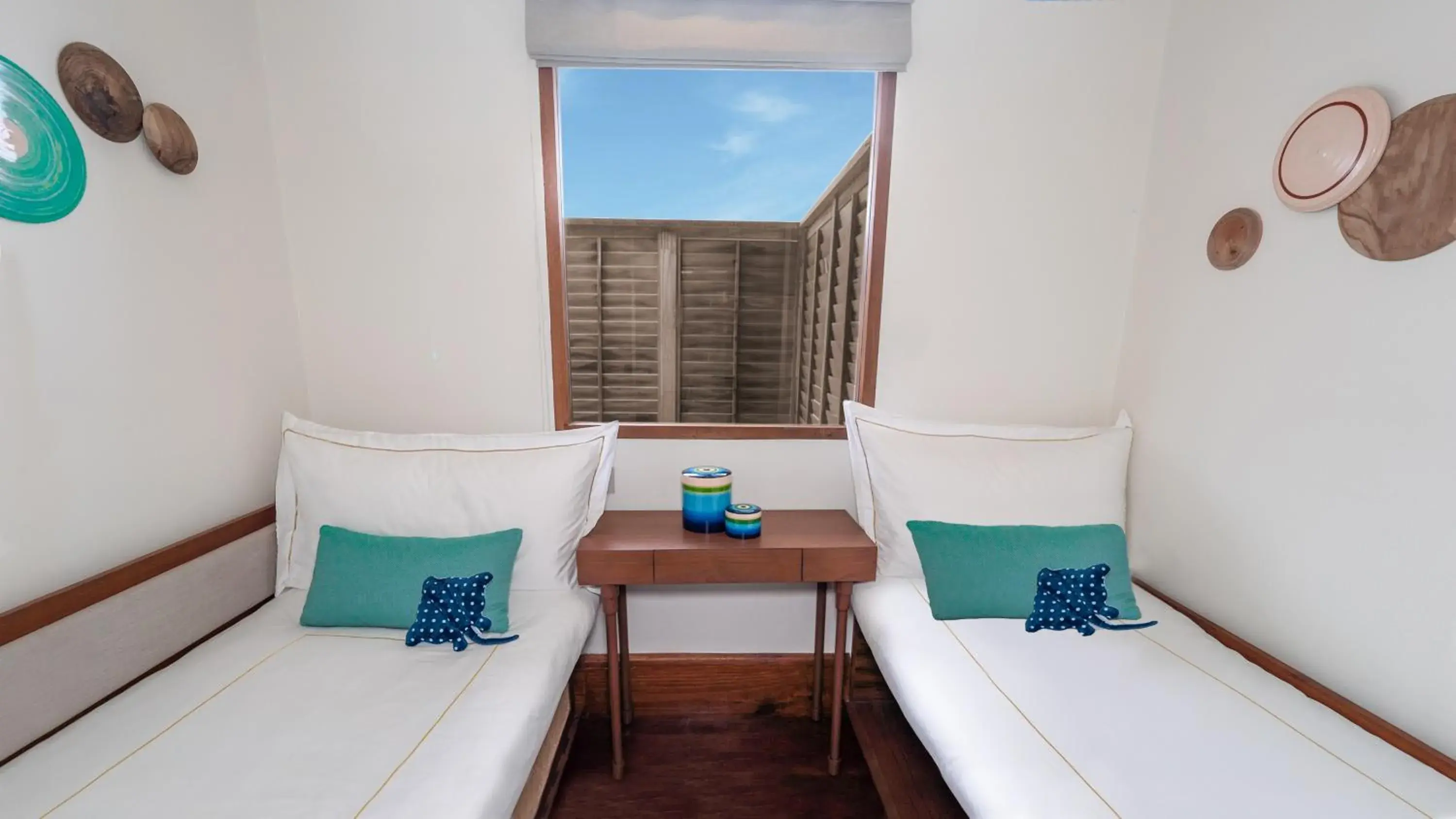Bed in Anantara Kihavah Maldives Villas Bed in Anantara Kihavah Maldives Villas