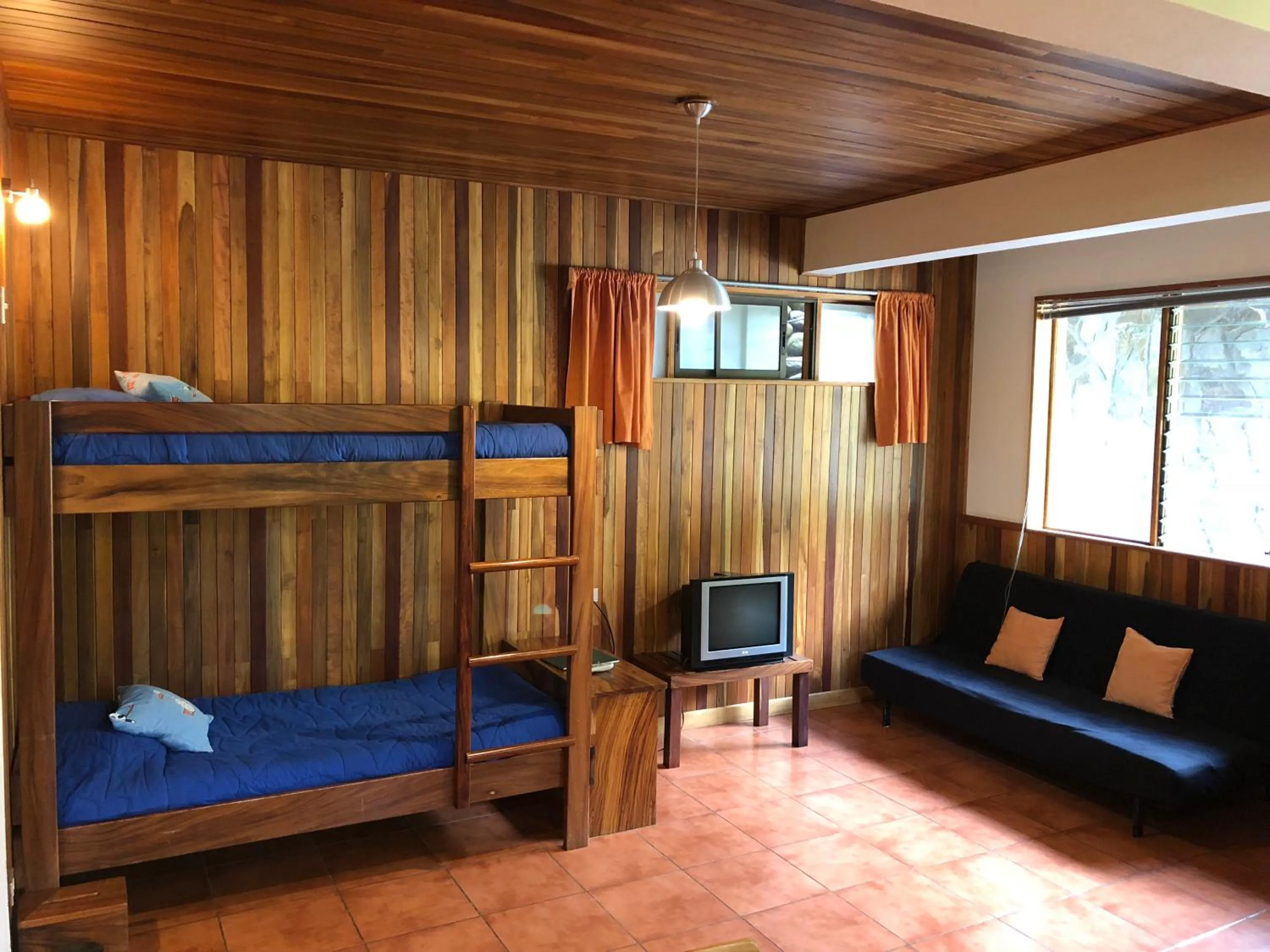 Living room, Bed in Arco Iris Lodge