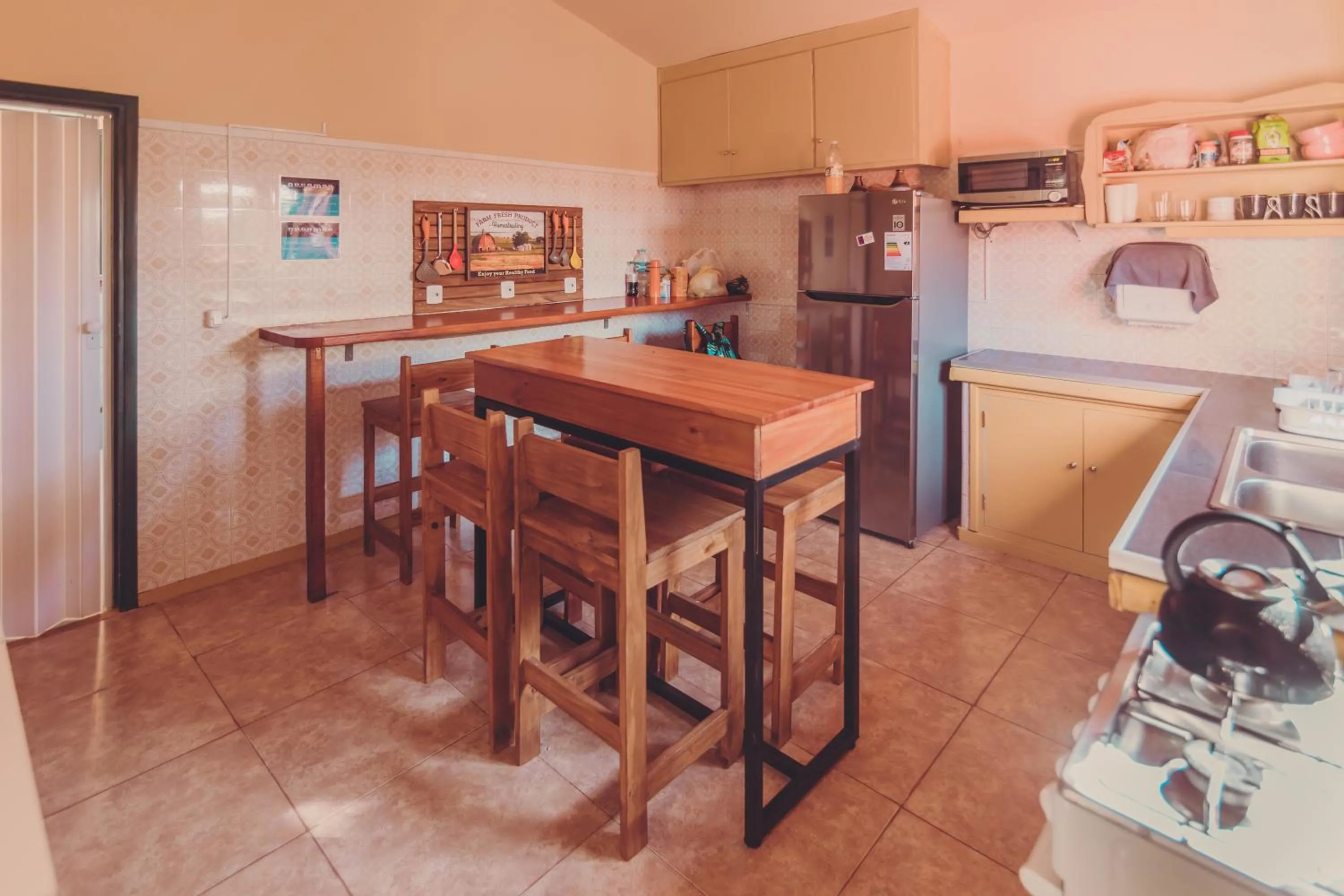 Kitchen or kitchenette in RocaMar Hostel Boutique