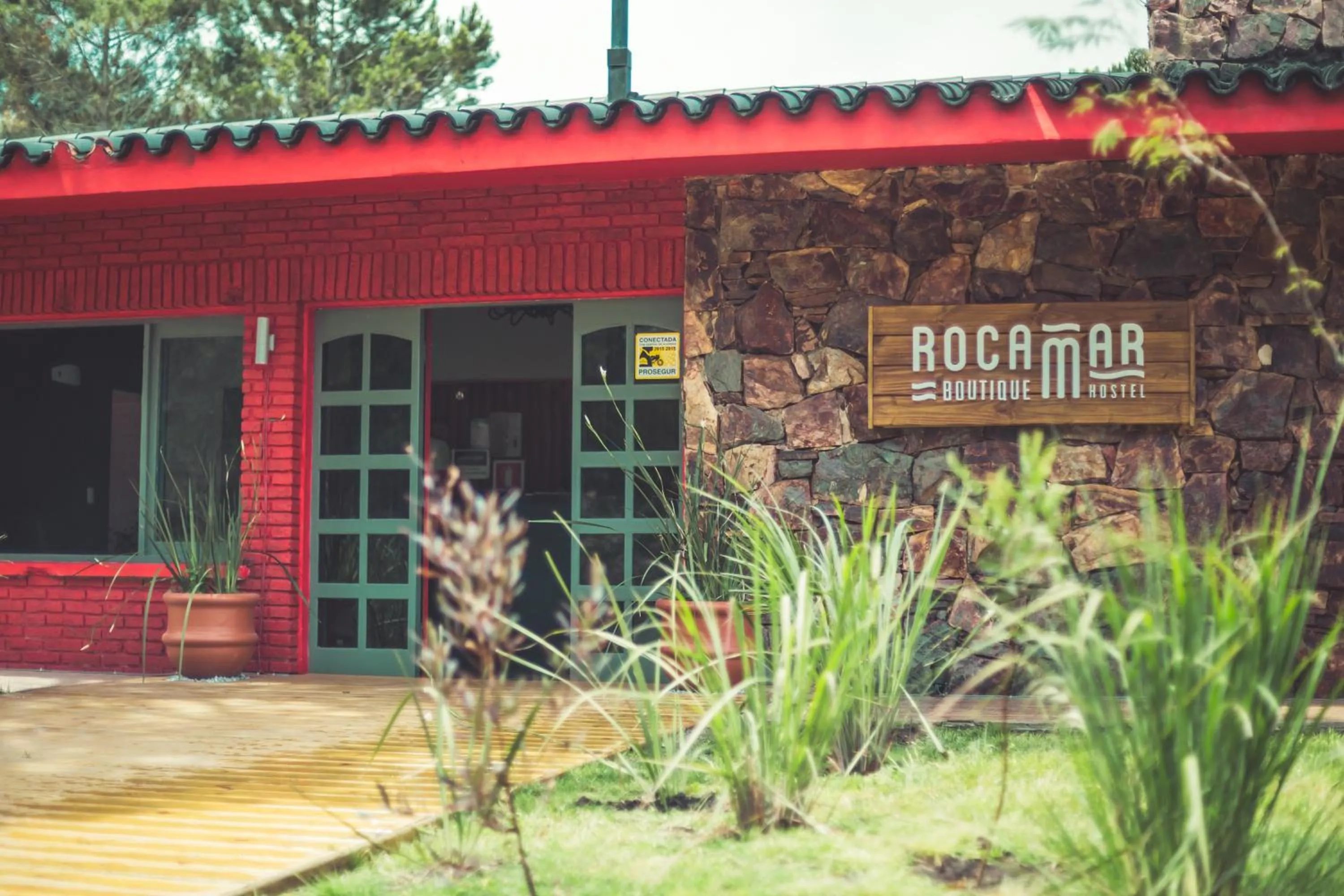 Property logo or sign in RocaMar Hostel Boutique
