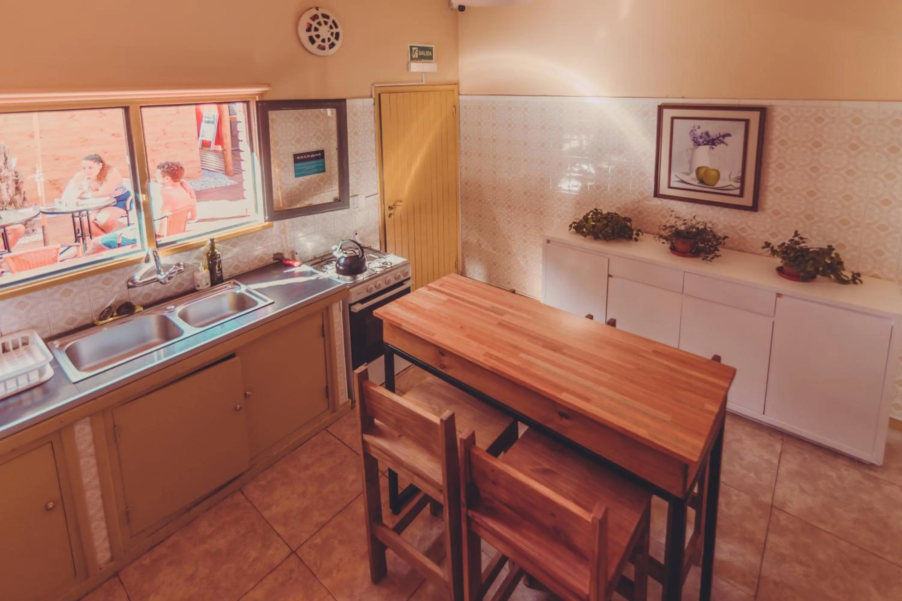 Communal kitchen in RocaMar Hostel Boutique