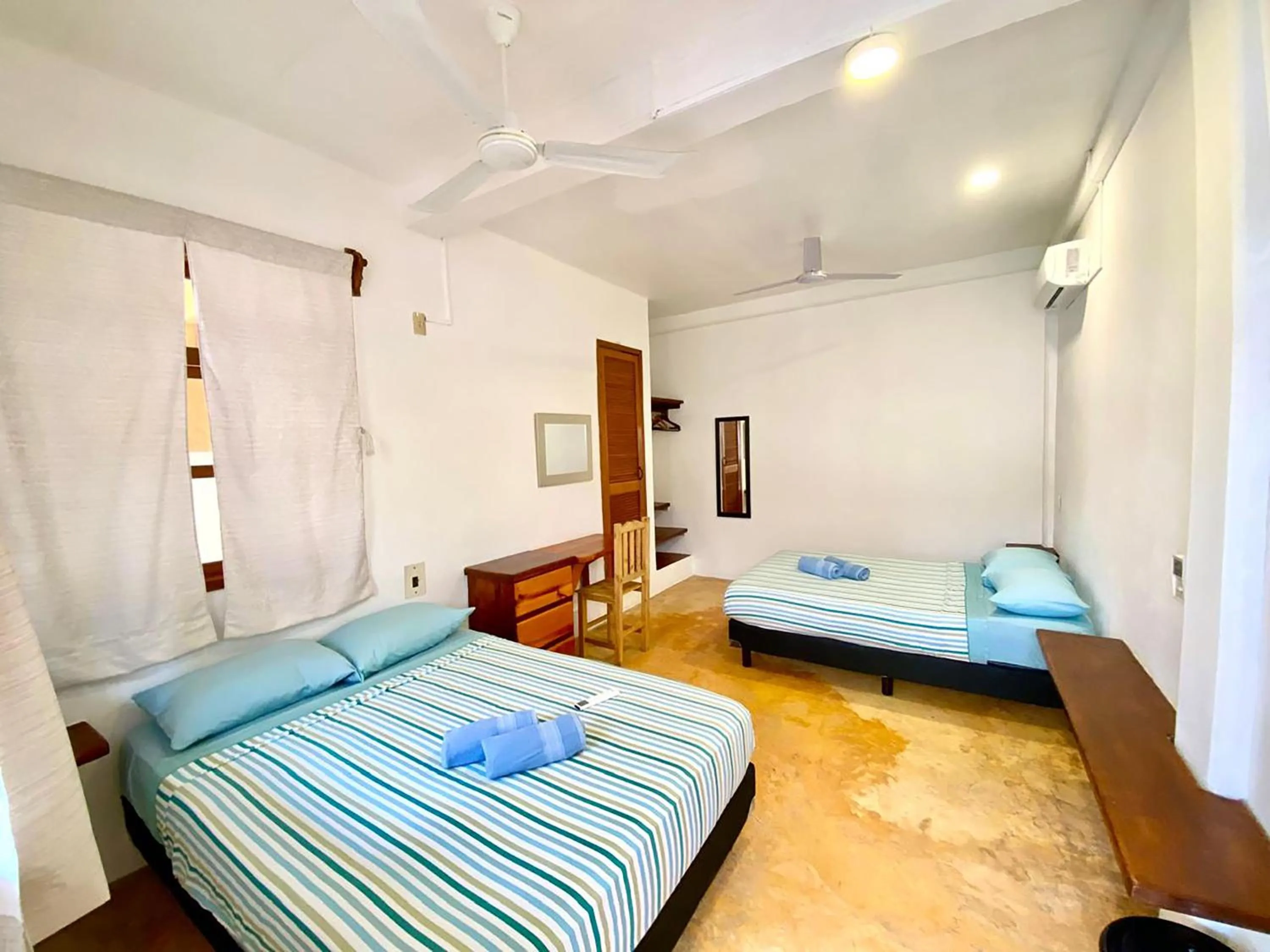 Bed in Hotel Papaya Surf