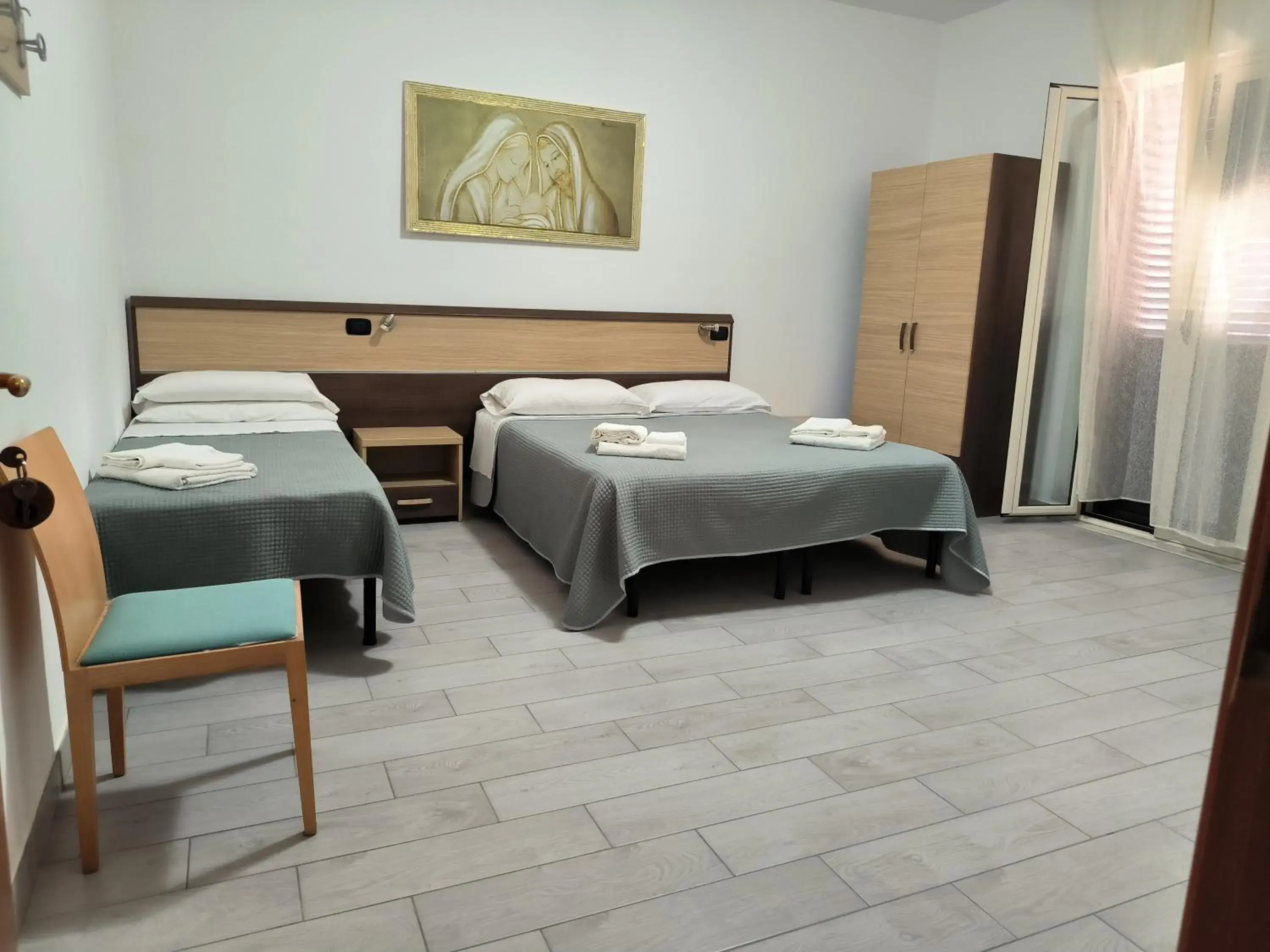 Quadruple Room in Hotel 4 Lampioni Quadruple Room in Hotel 4 Lampioni