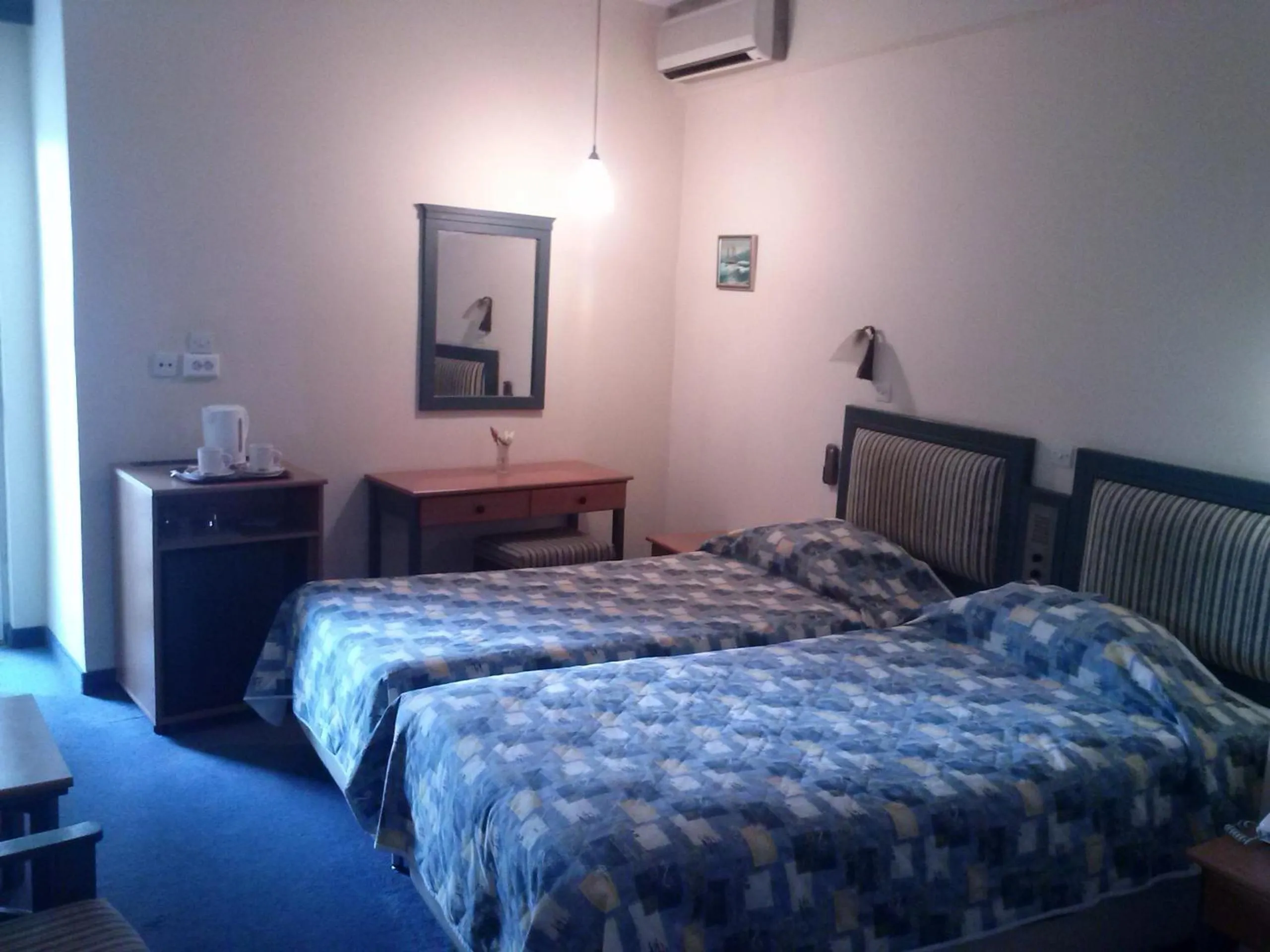 Bedroom, Bed in Astron Hotel