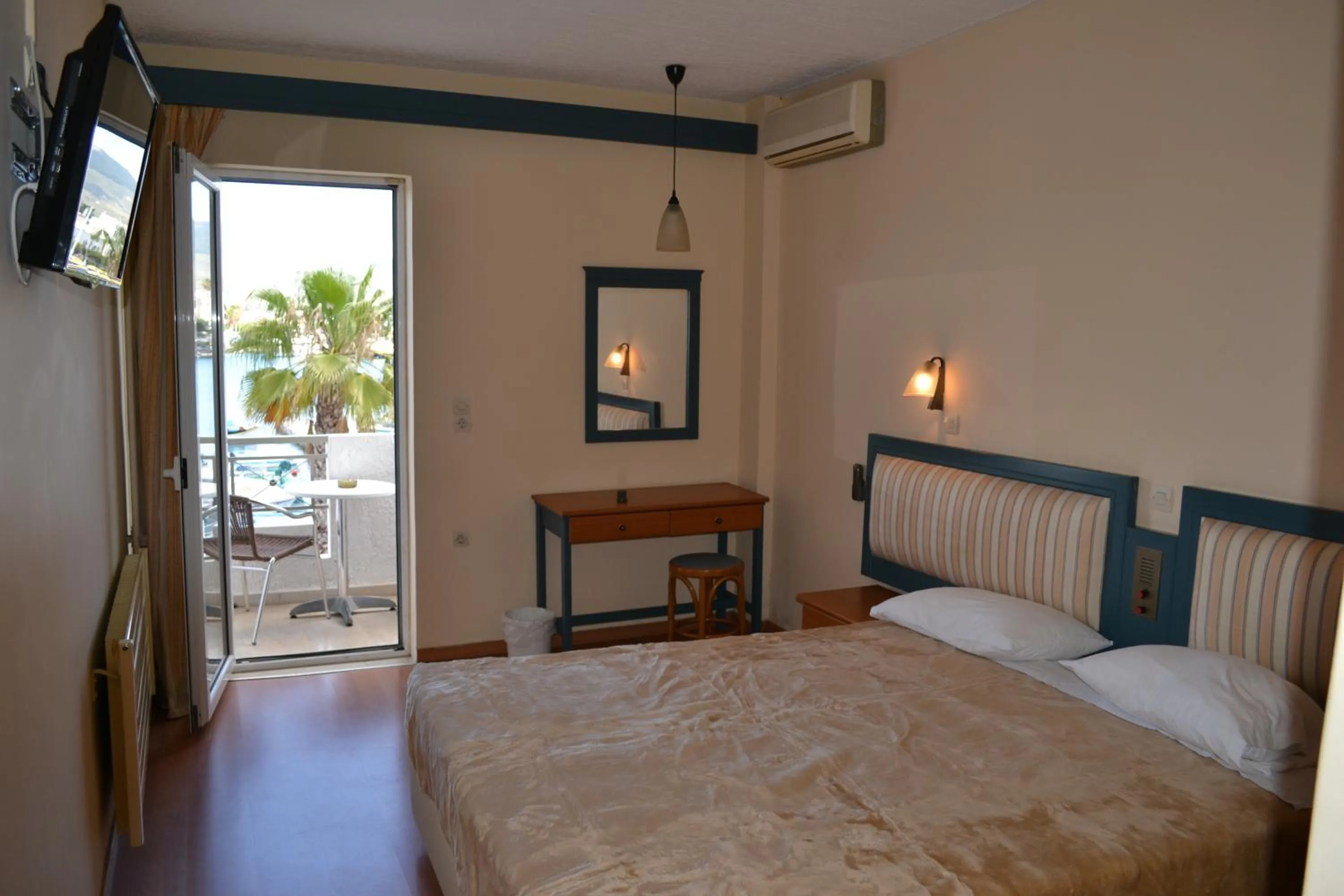 Bedroom, Bed in Astron Hotel