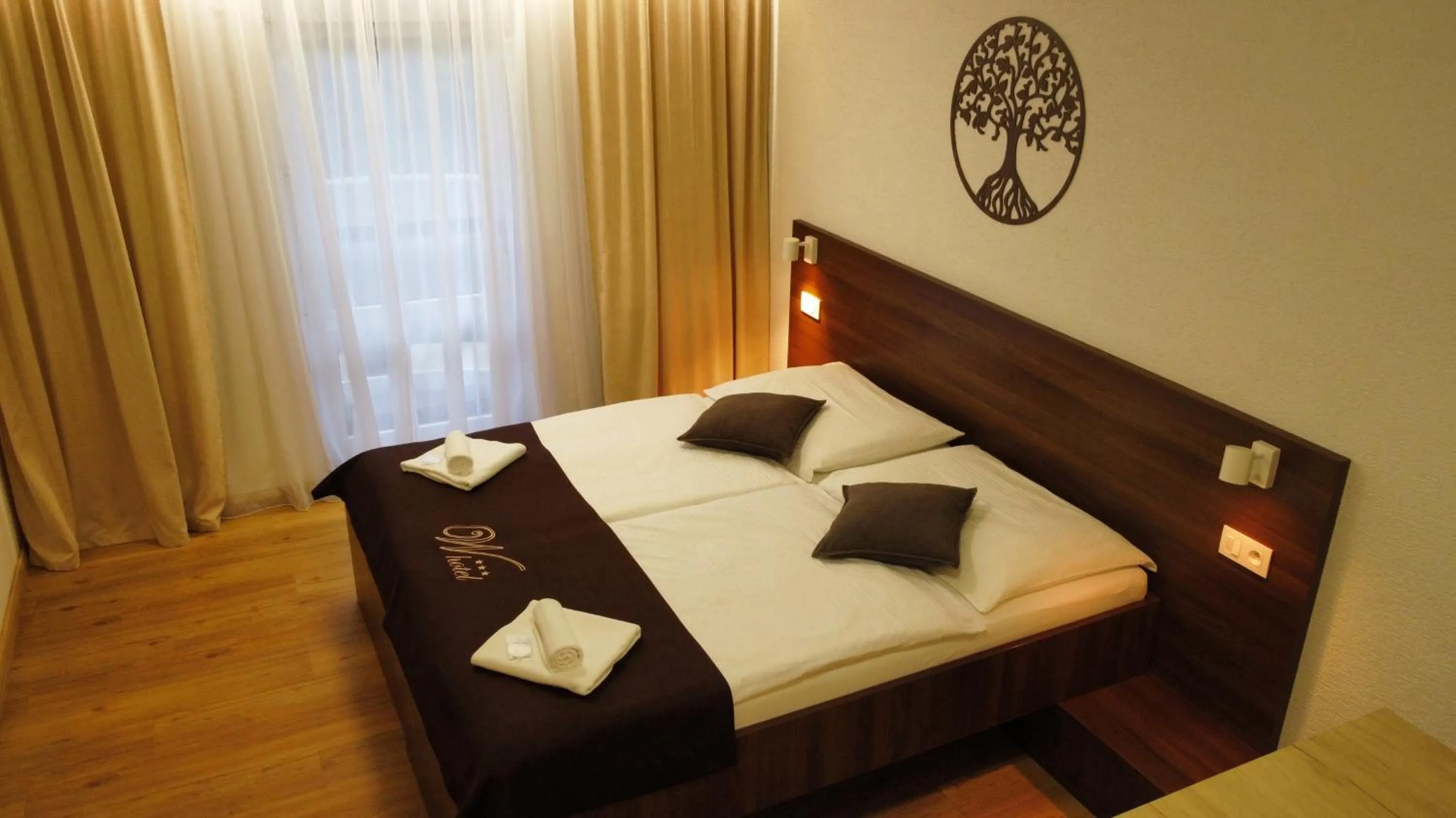 Photo of the whole room, Bed in WX Hotel