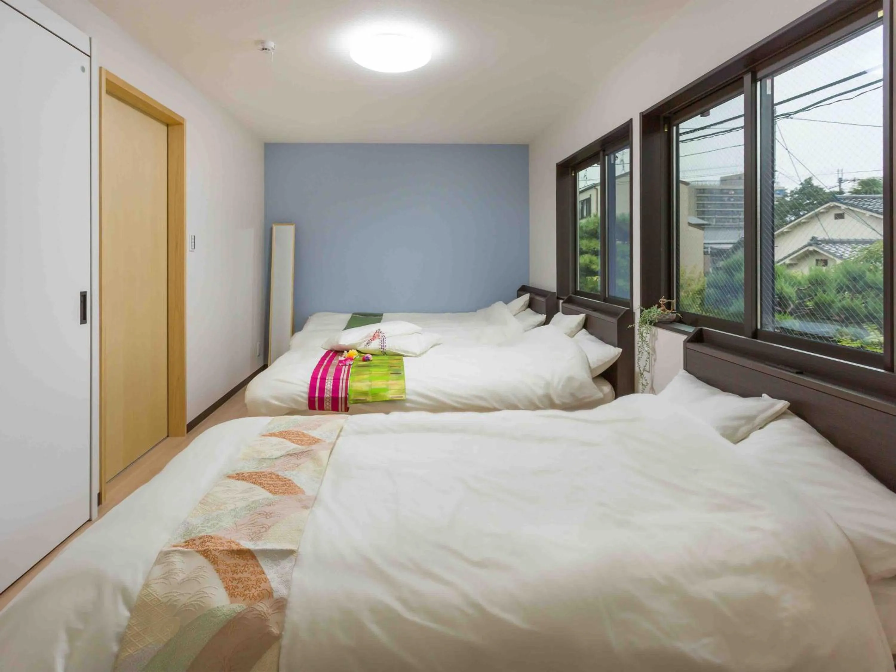 Photo of the whole room, Bed in Marikoji Inn Kyoto