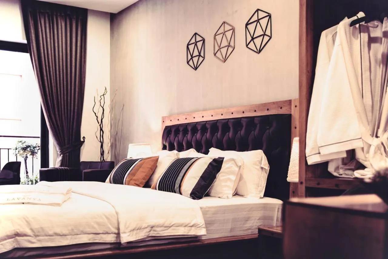 Bed in Lavanya Boutique Hotel