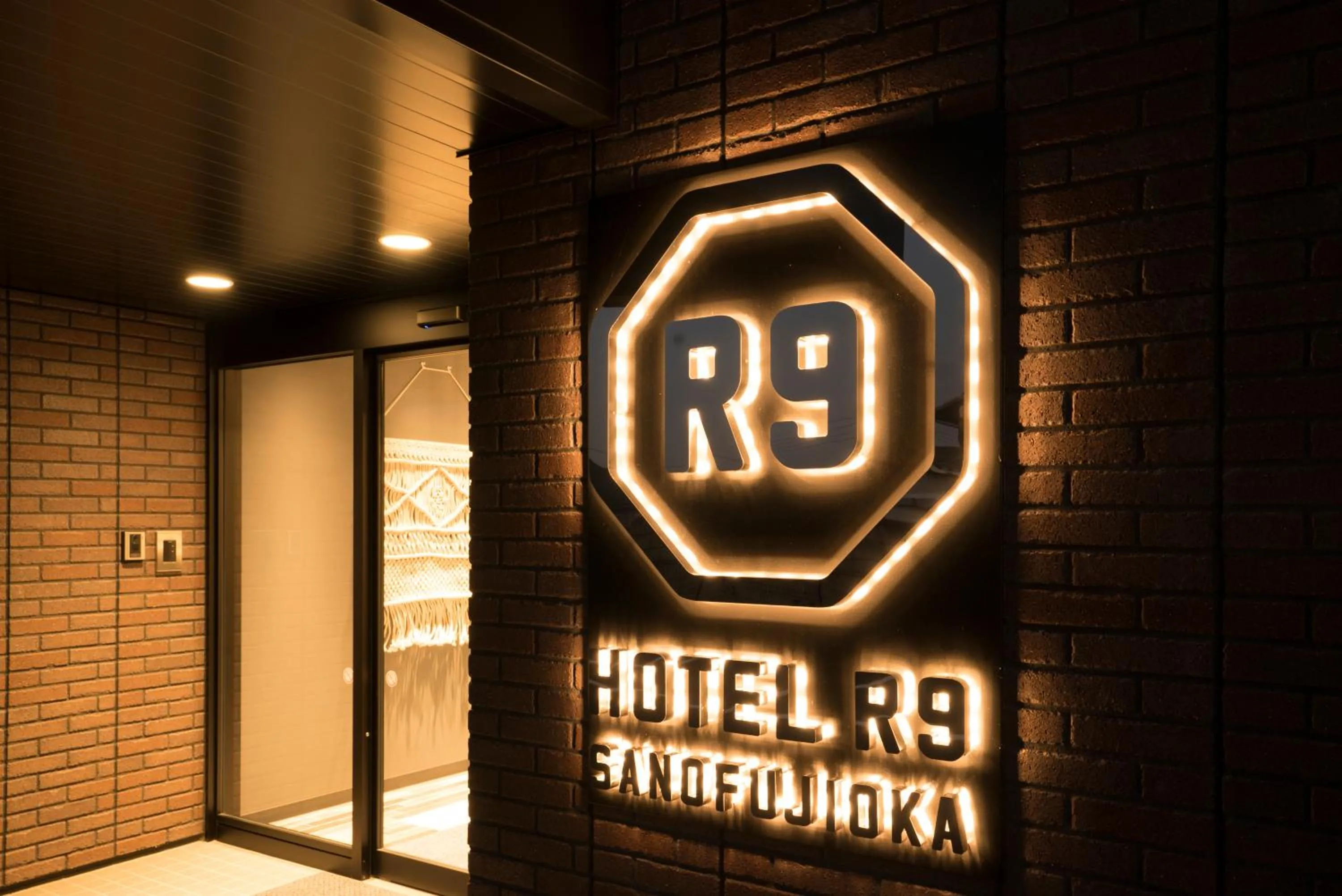 Property logo or sign in Hotel R9 Sano Fujioka