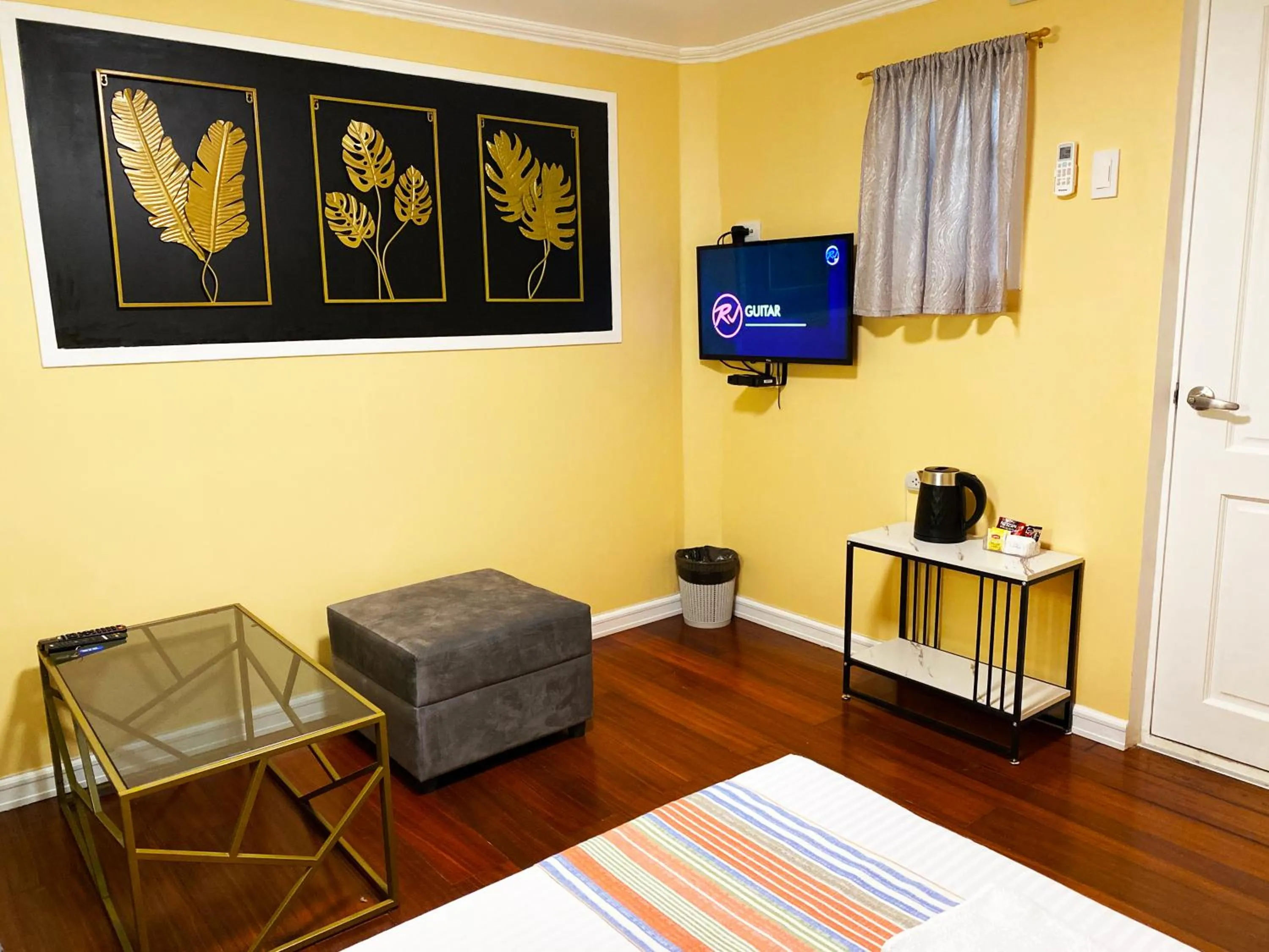 TV and multimedia in Little Norway Guesthouse - Mactan Cebu International Airport