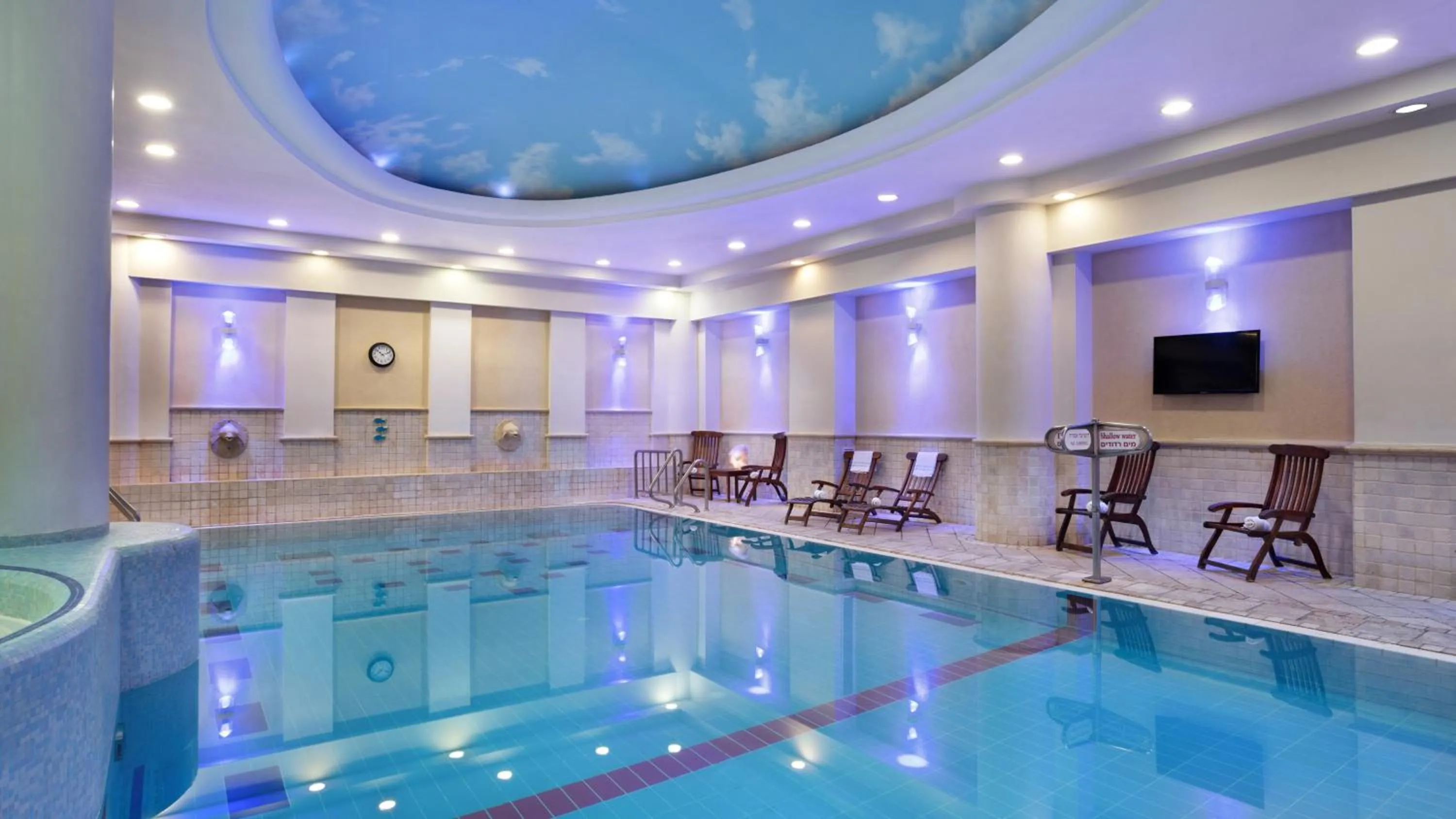 Swimming pool in Crowne Plaza Haifa by IHG