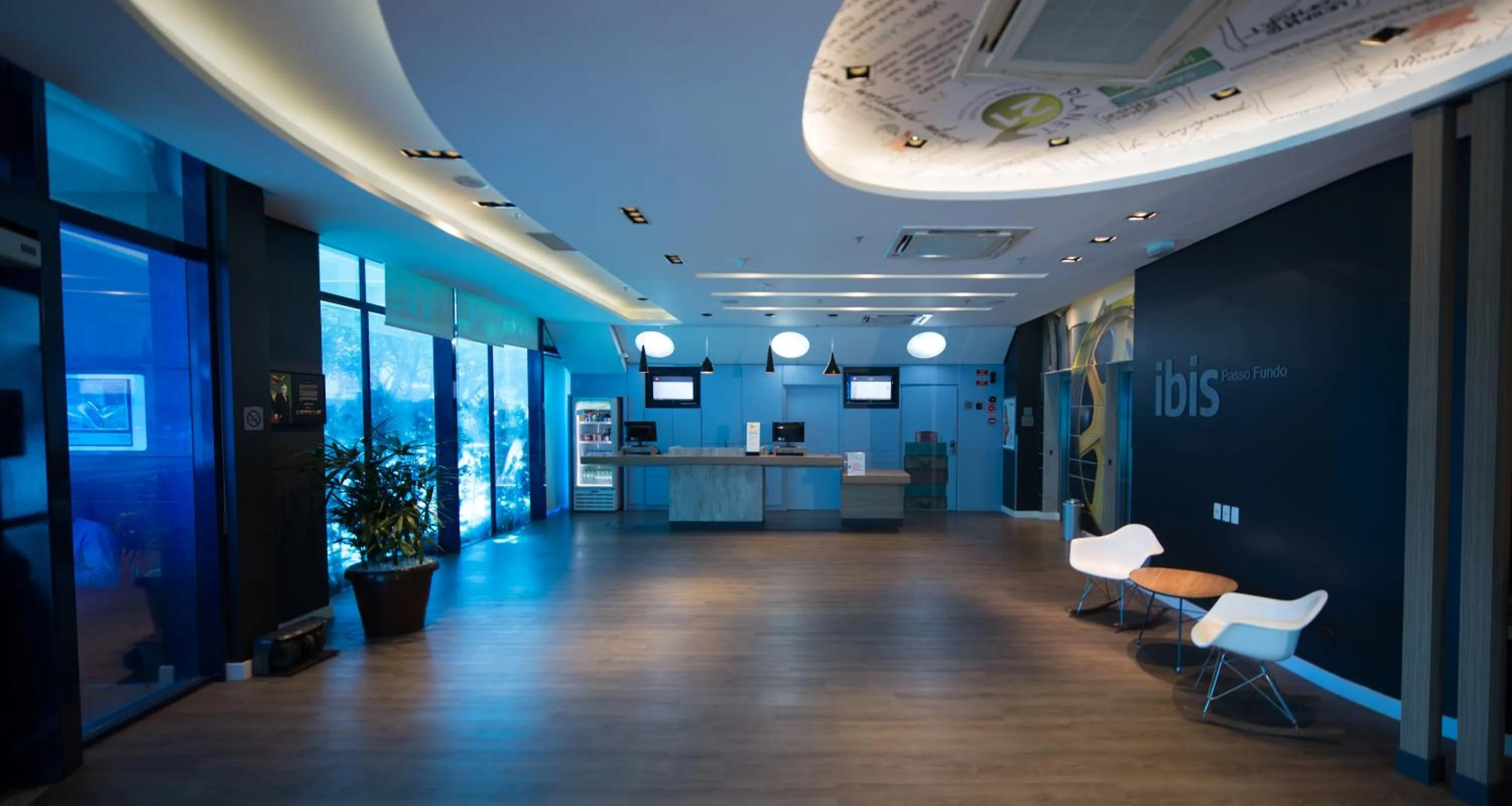 Lobby or reception in ibis Passo Fundo Centro