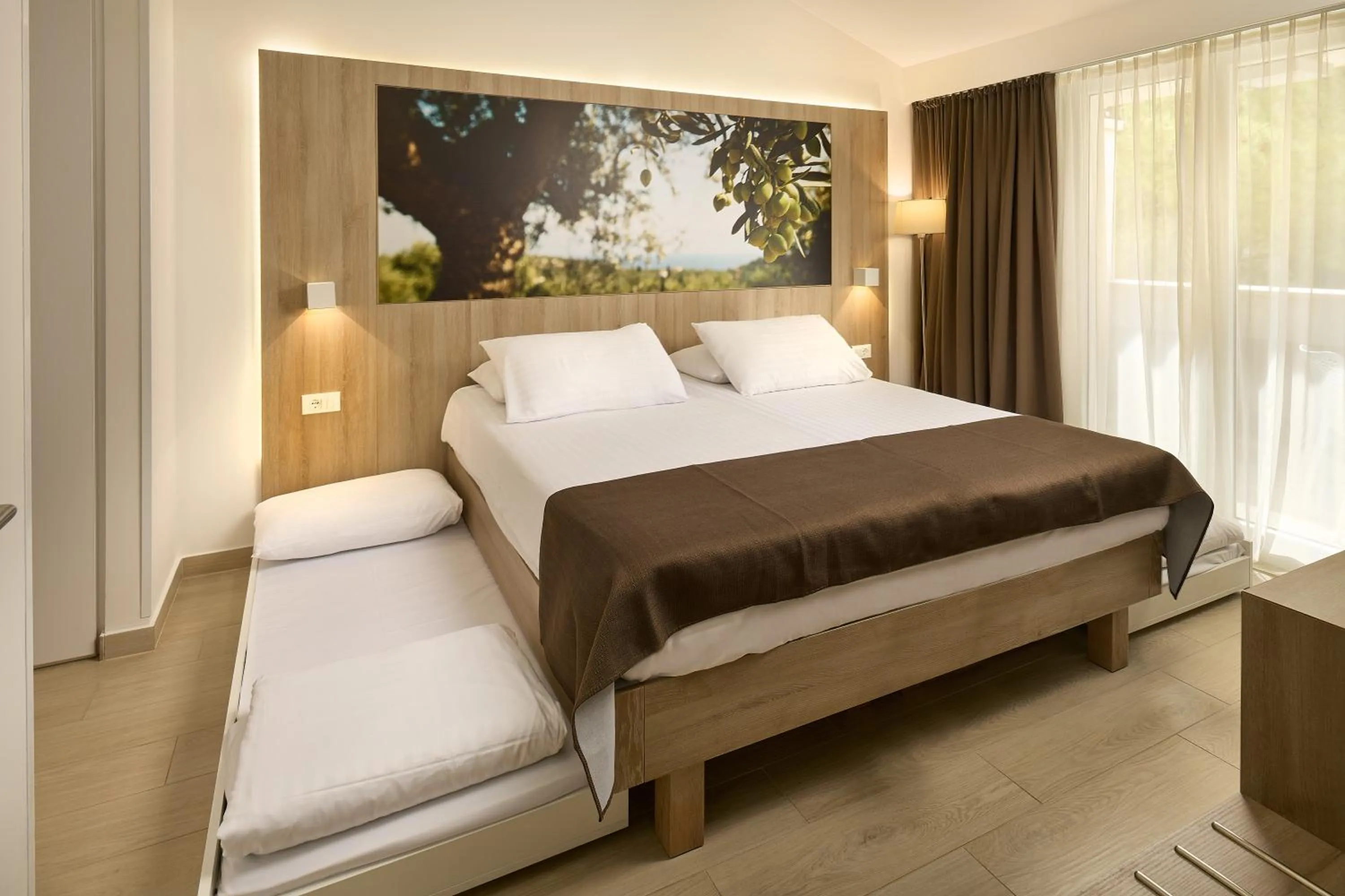 Photo of the whole room, Bed in Medora Auri Family Beach Resort