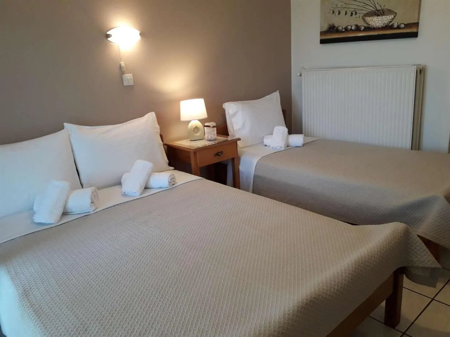 Bed in Olympus View Rooms Sauna & Spa