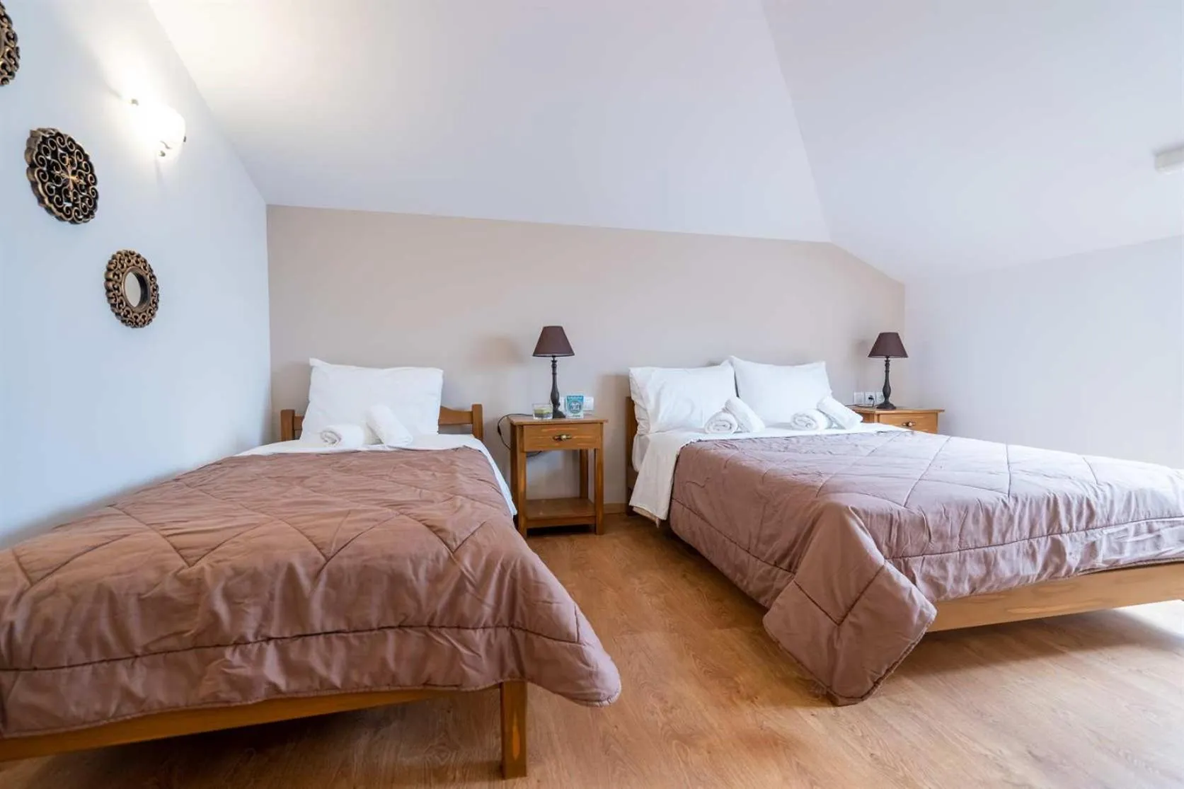 Bed in Olympus View Rooms Sauna & Spa