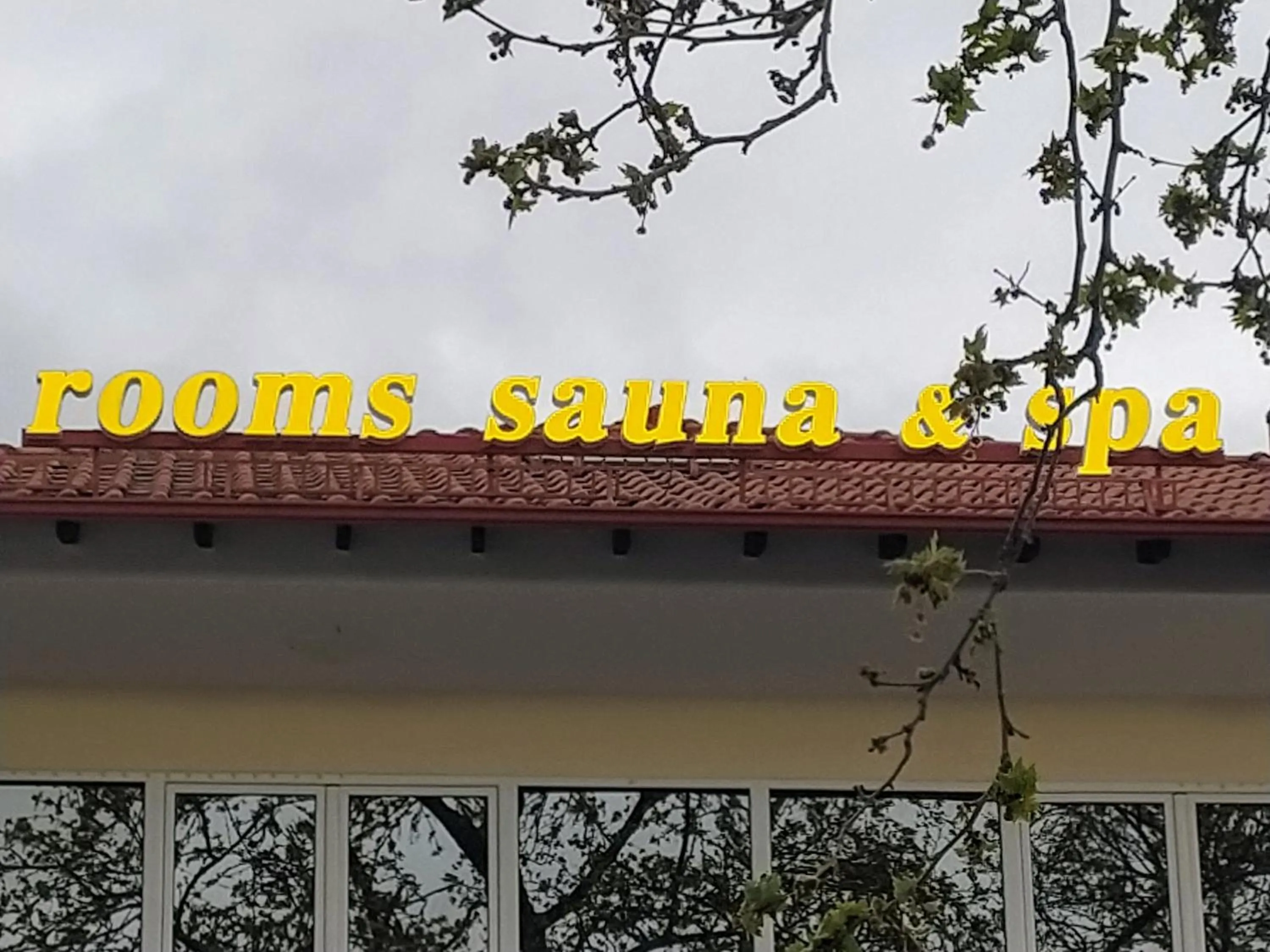 Logo/Certificate/Sign in Olympus View Rooms Sauna & Spa