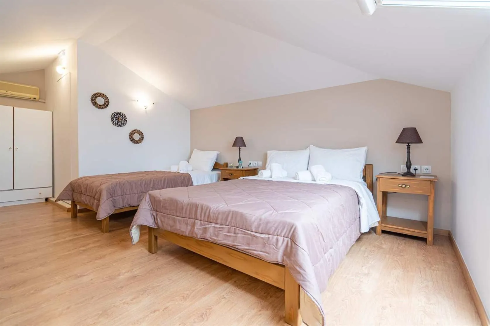 Bed in Olympus View Rooms Sauna & Spa