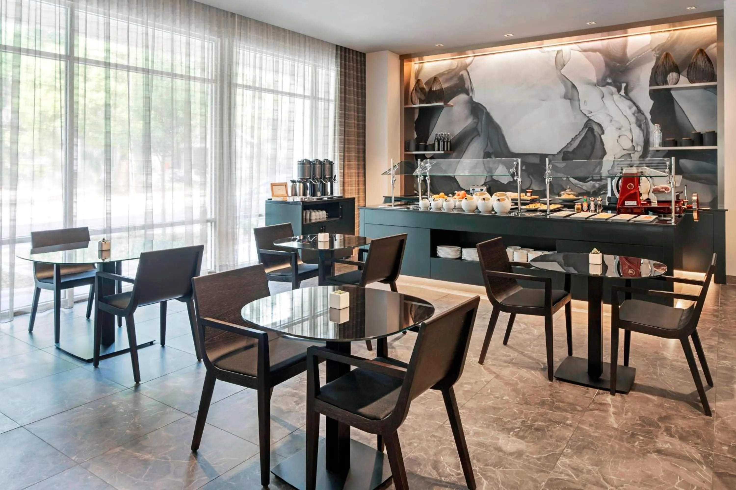 Kitchen or kitchenette in AC Hotel by Marriott Gainesville Downtown