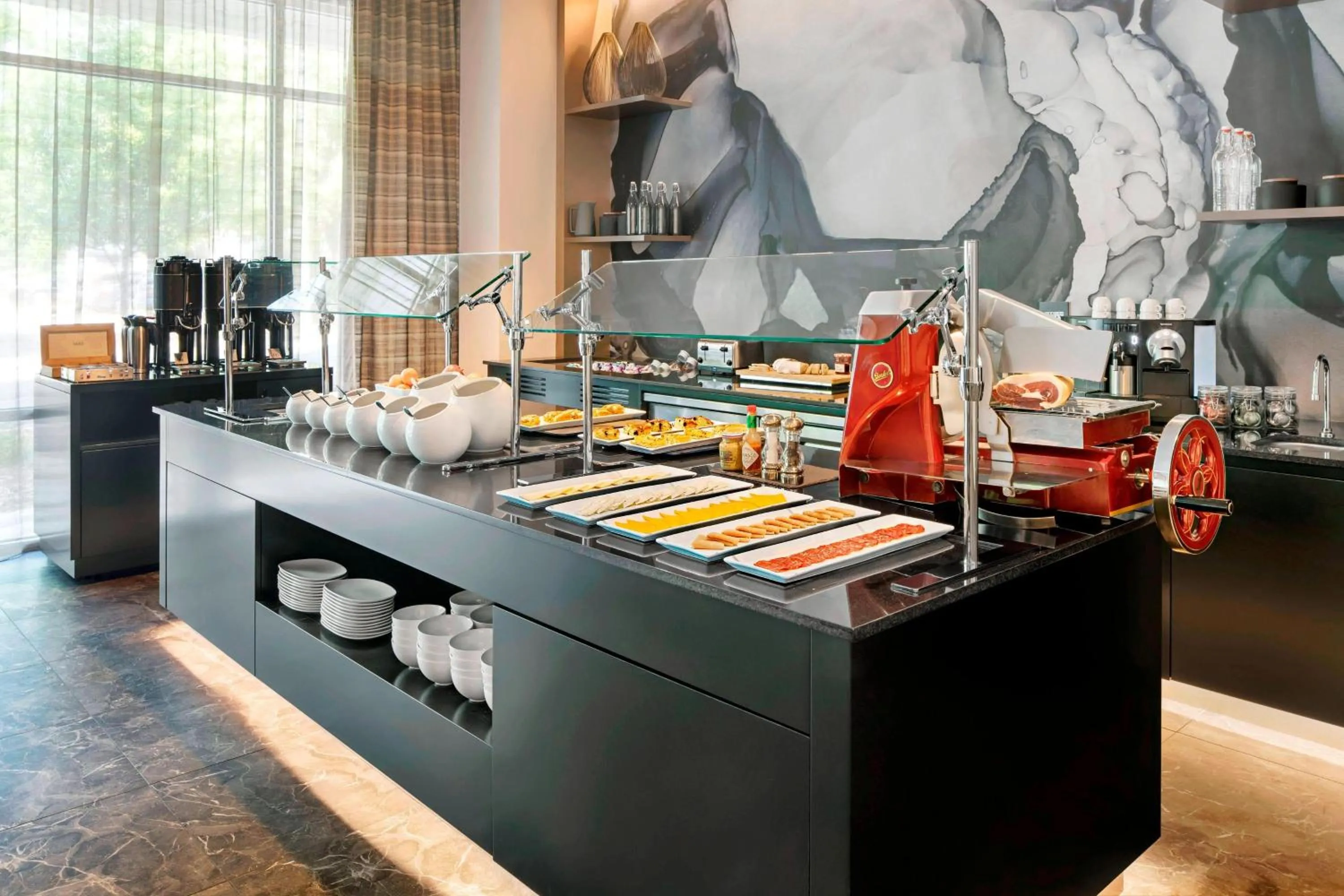 Kitchen or kitchenette in AC Hotel by Marriott Gainesville Downtown