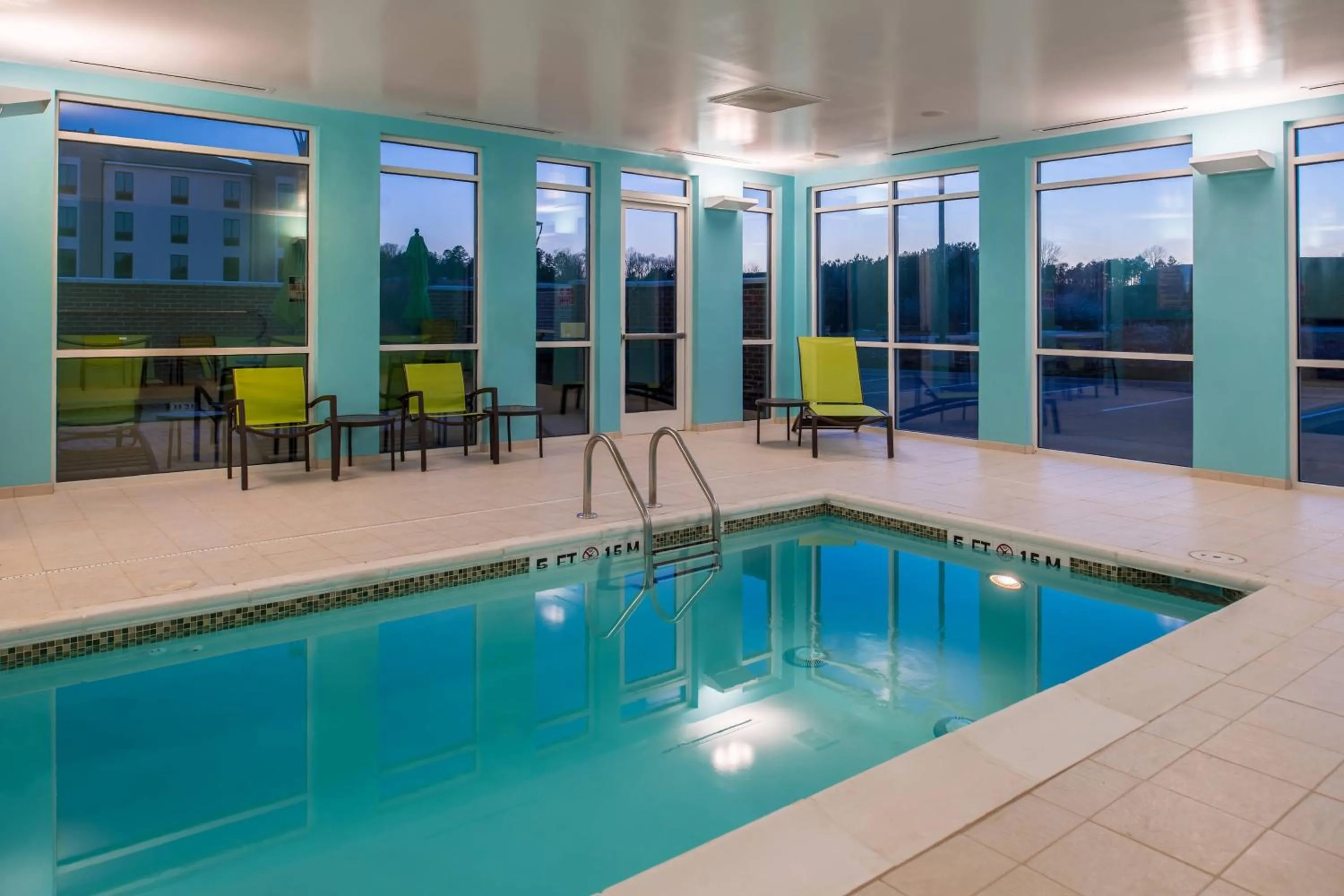 Swimming pool in SpringHill Suites by Marriott Greensboro Airport