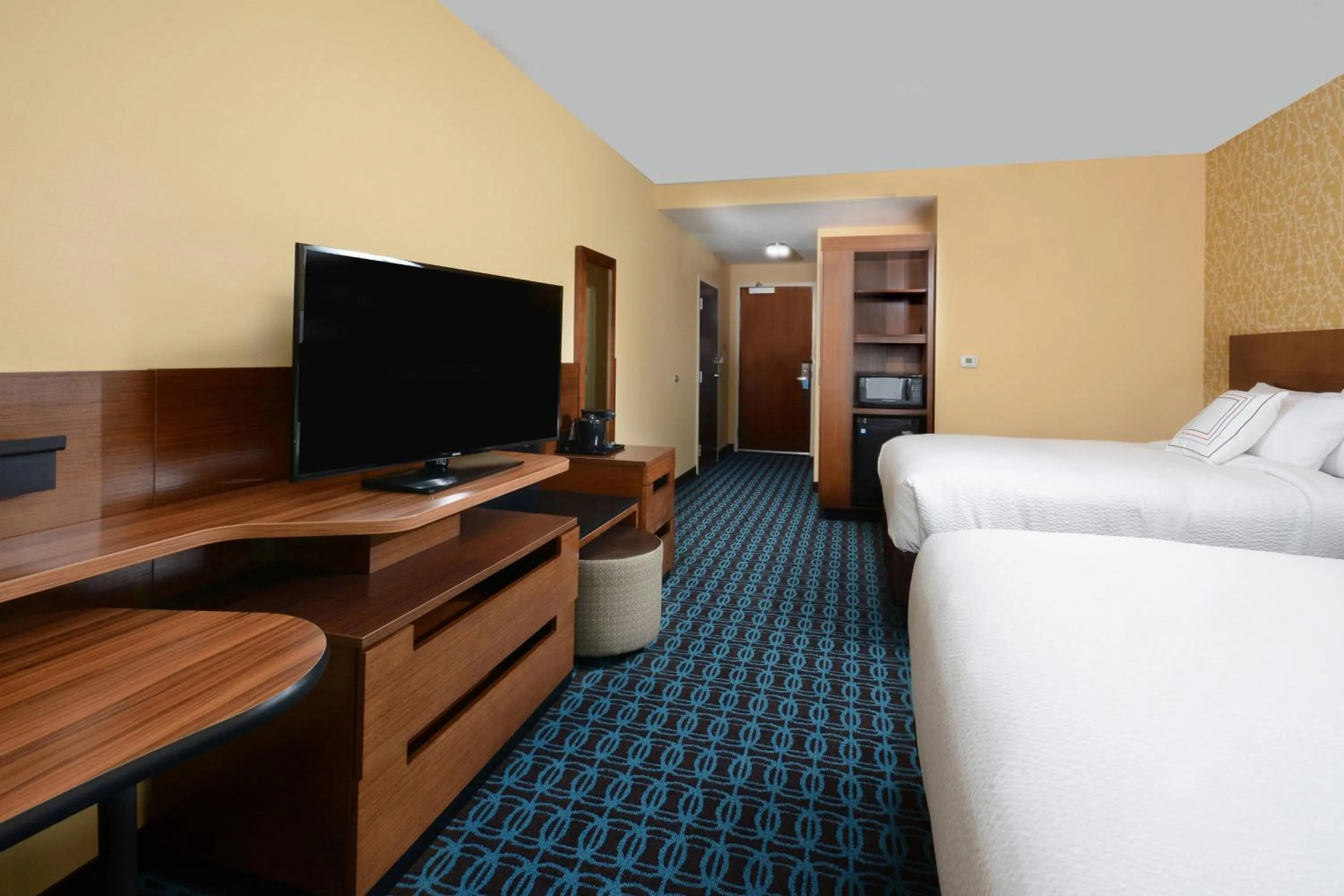 Photo of the whole room, Bed in Fairfield Inn & Suites by Marriott Raleigh Capital Blvd./I-540