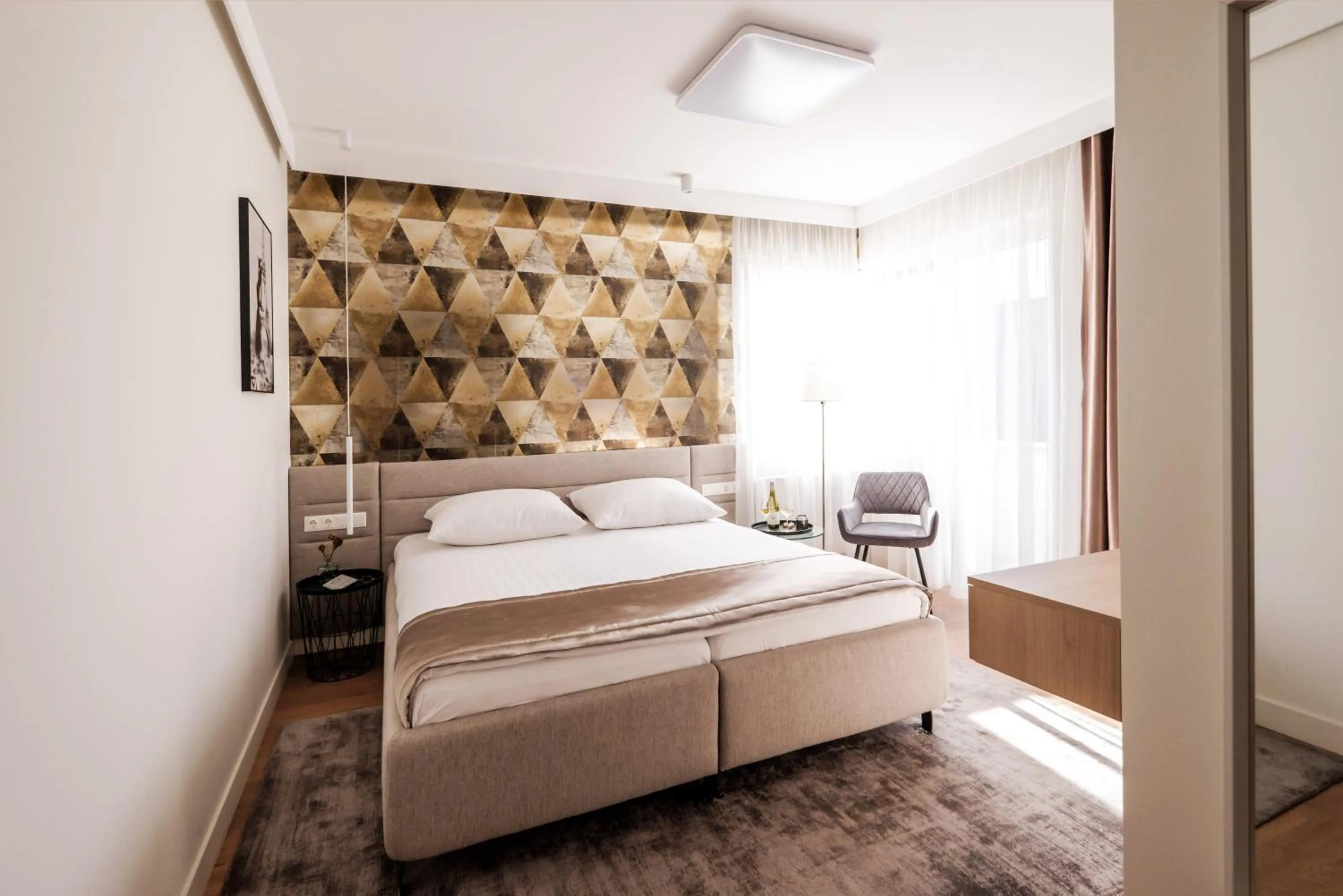 Bed in Adele Apartments