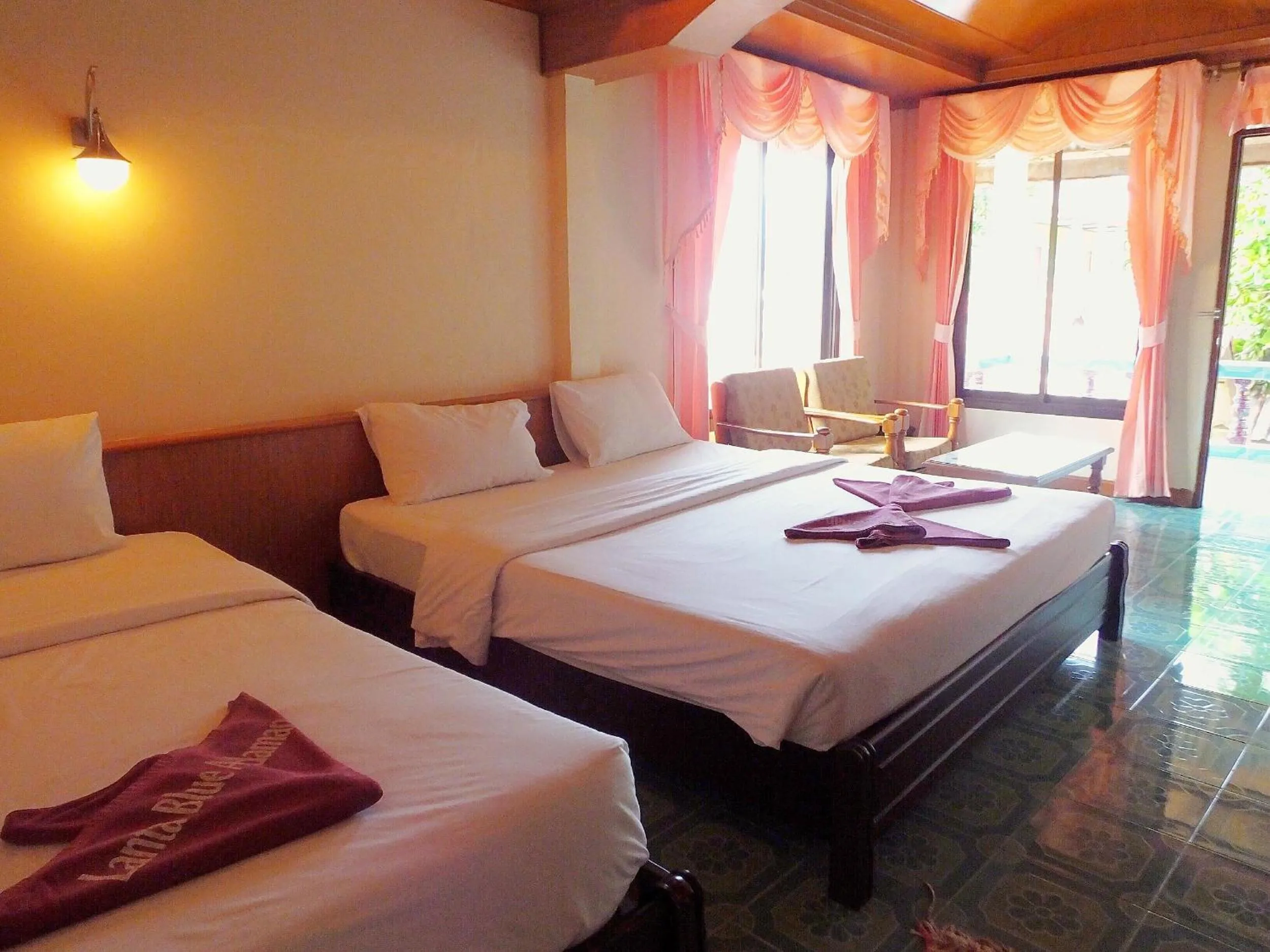 Bed in Blue Andaman Lanta Resort