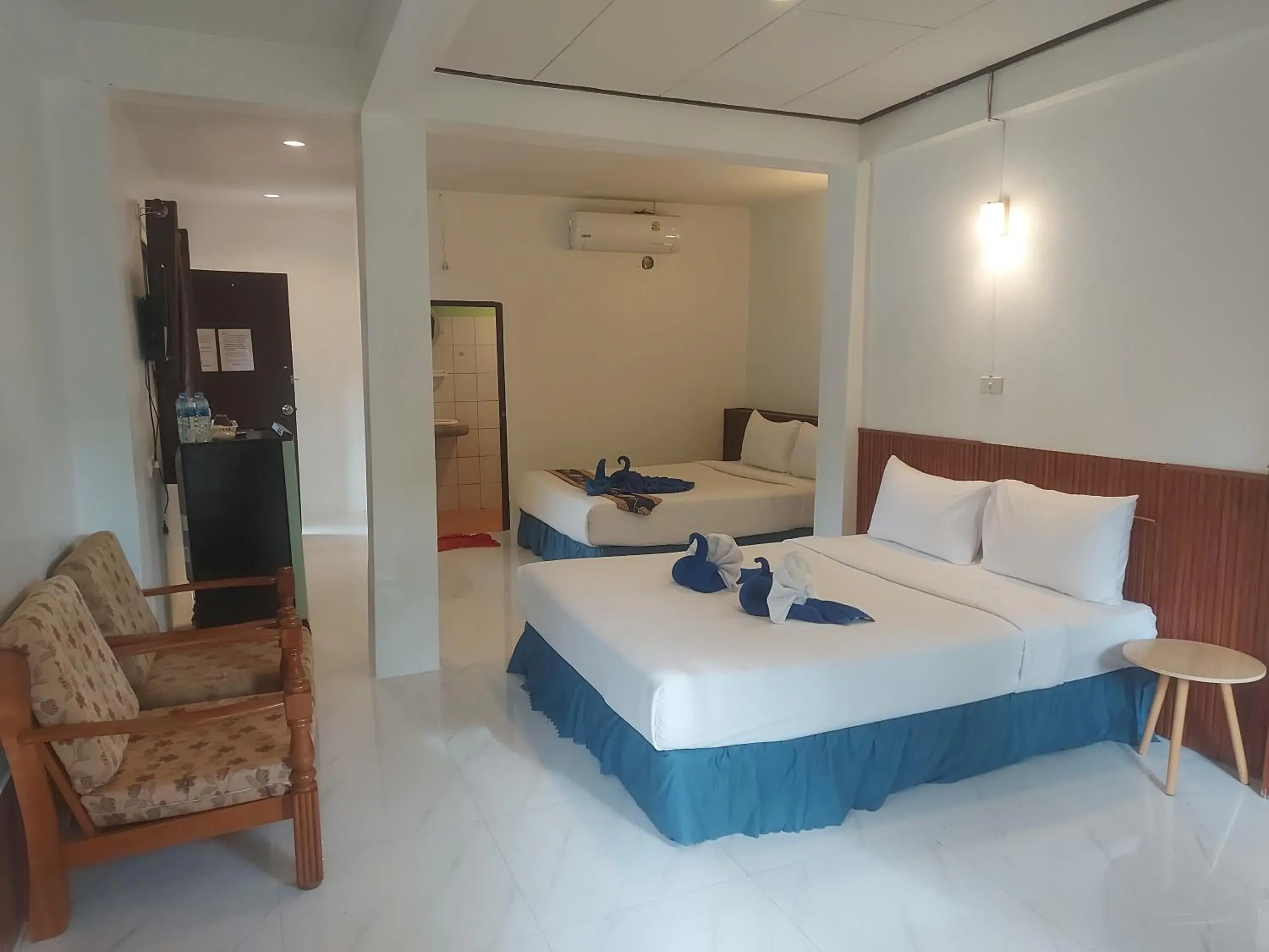 Bed in Blue Andaman Lanta Resort Bed in Blue Andaman Lanta Resort