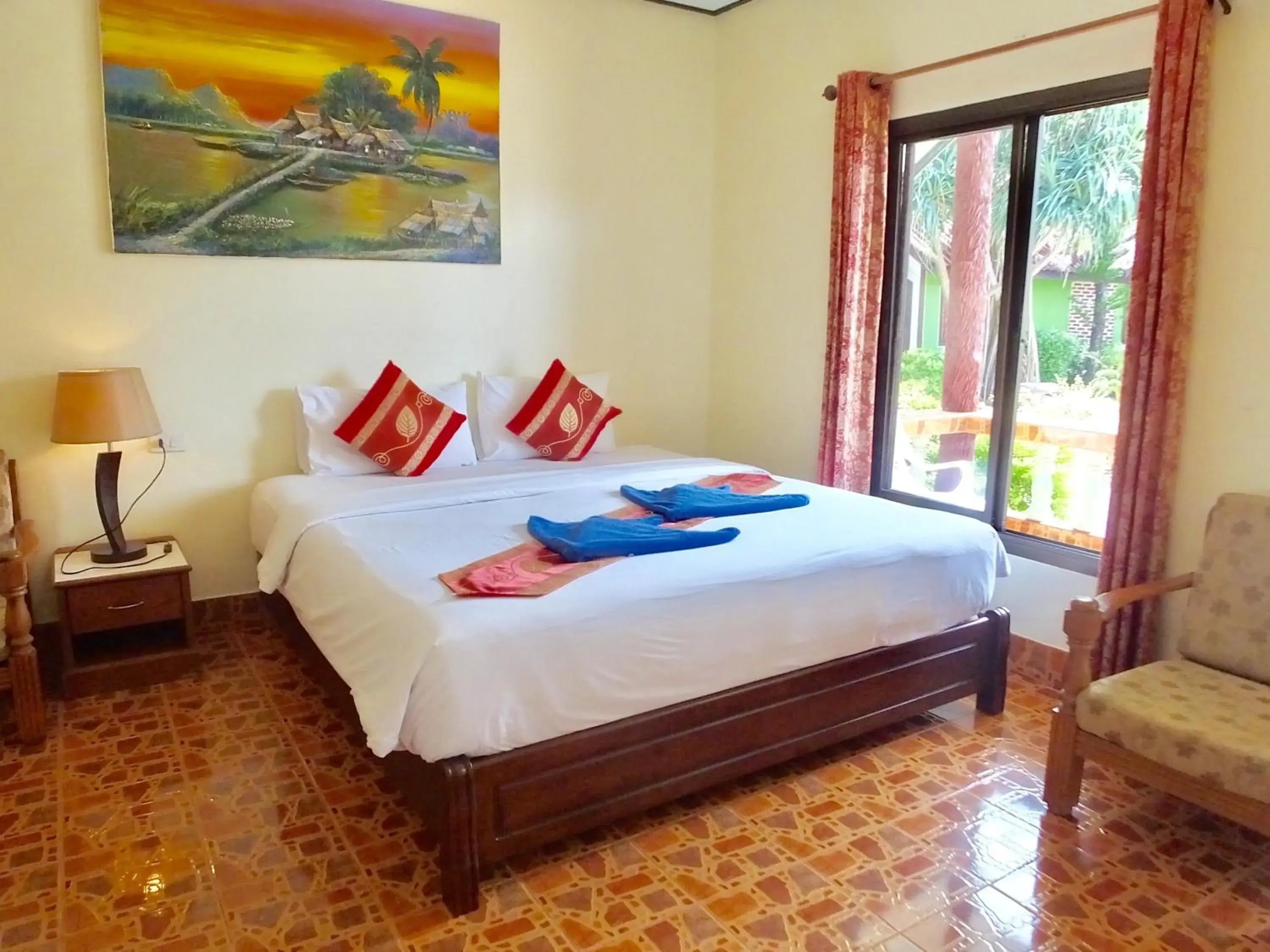 Bed in Blue Andaman Lanta Resort Bed in Blue Andaman Lanta Resort