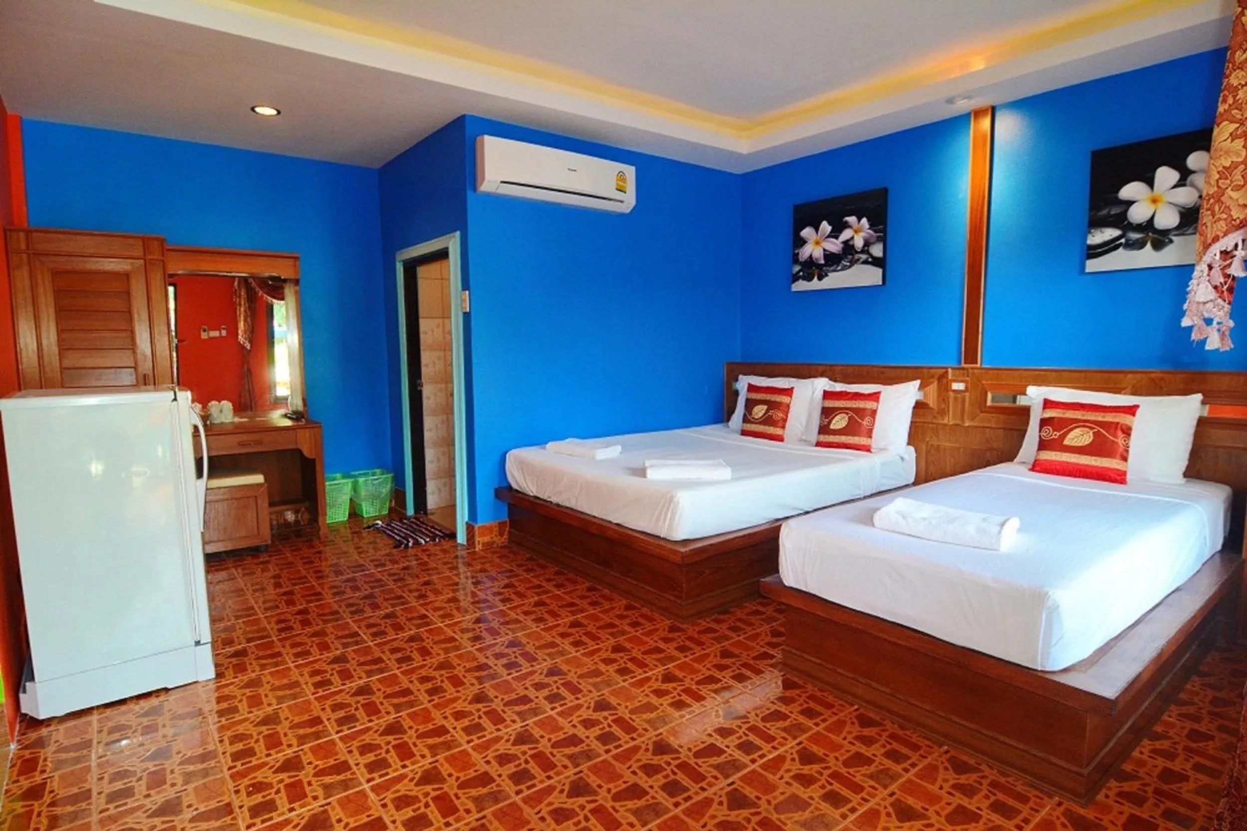 Bed in Blue Andaman Lanta Resort