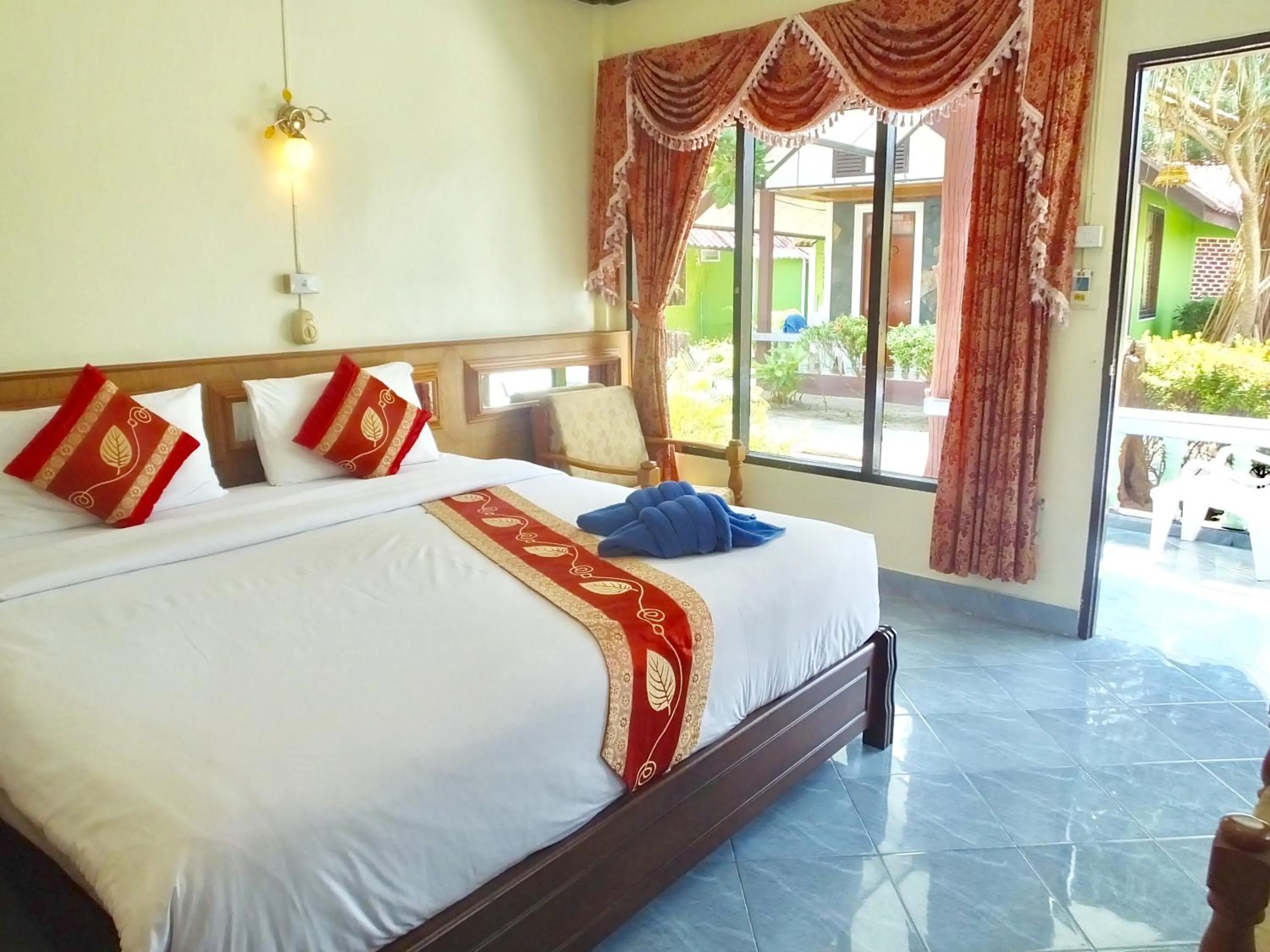 Bed in Blue Andaman Lanta Resort