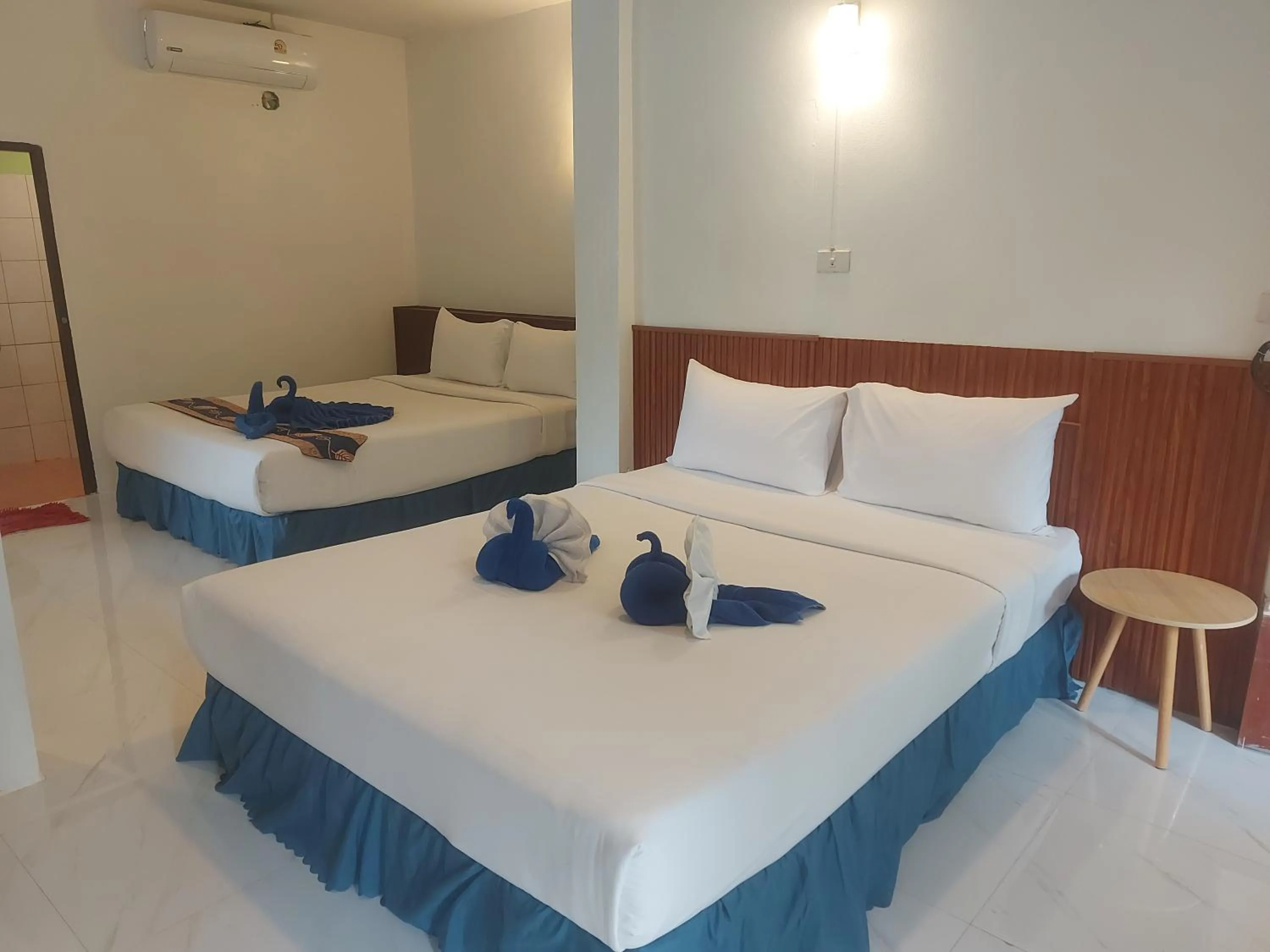 Bed in Blue Andaman Lanta Resort