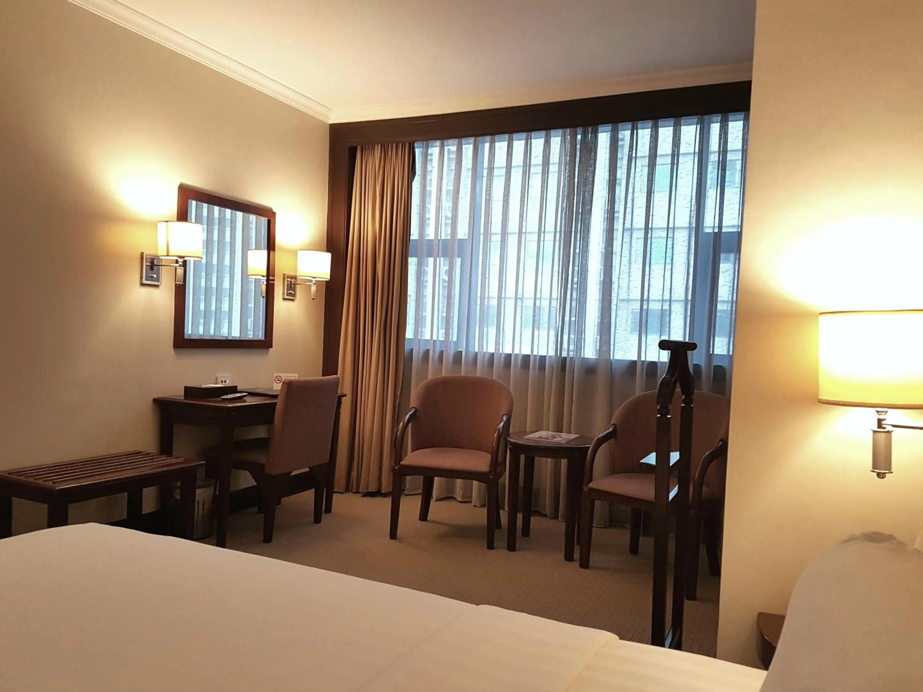 Bed in Cebu Parklane International Hotel