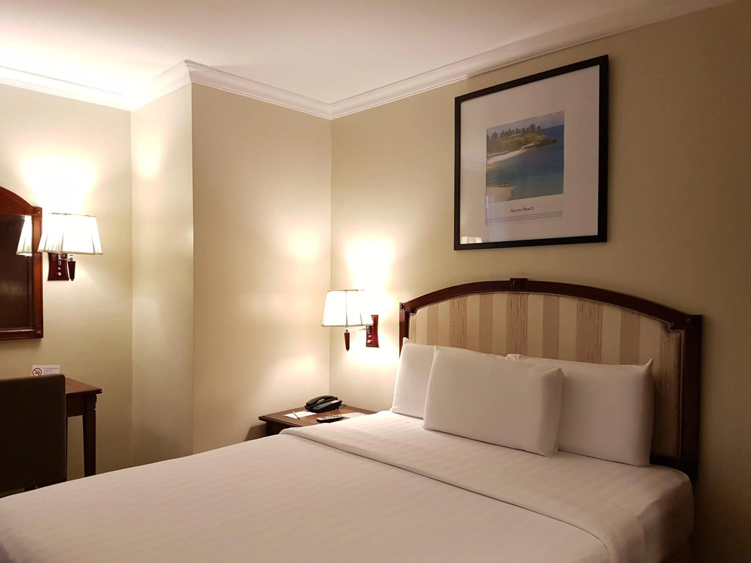 Bed in Cebu Parklane International Hotel