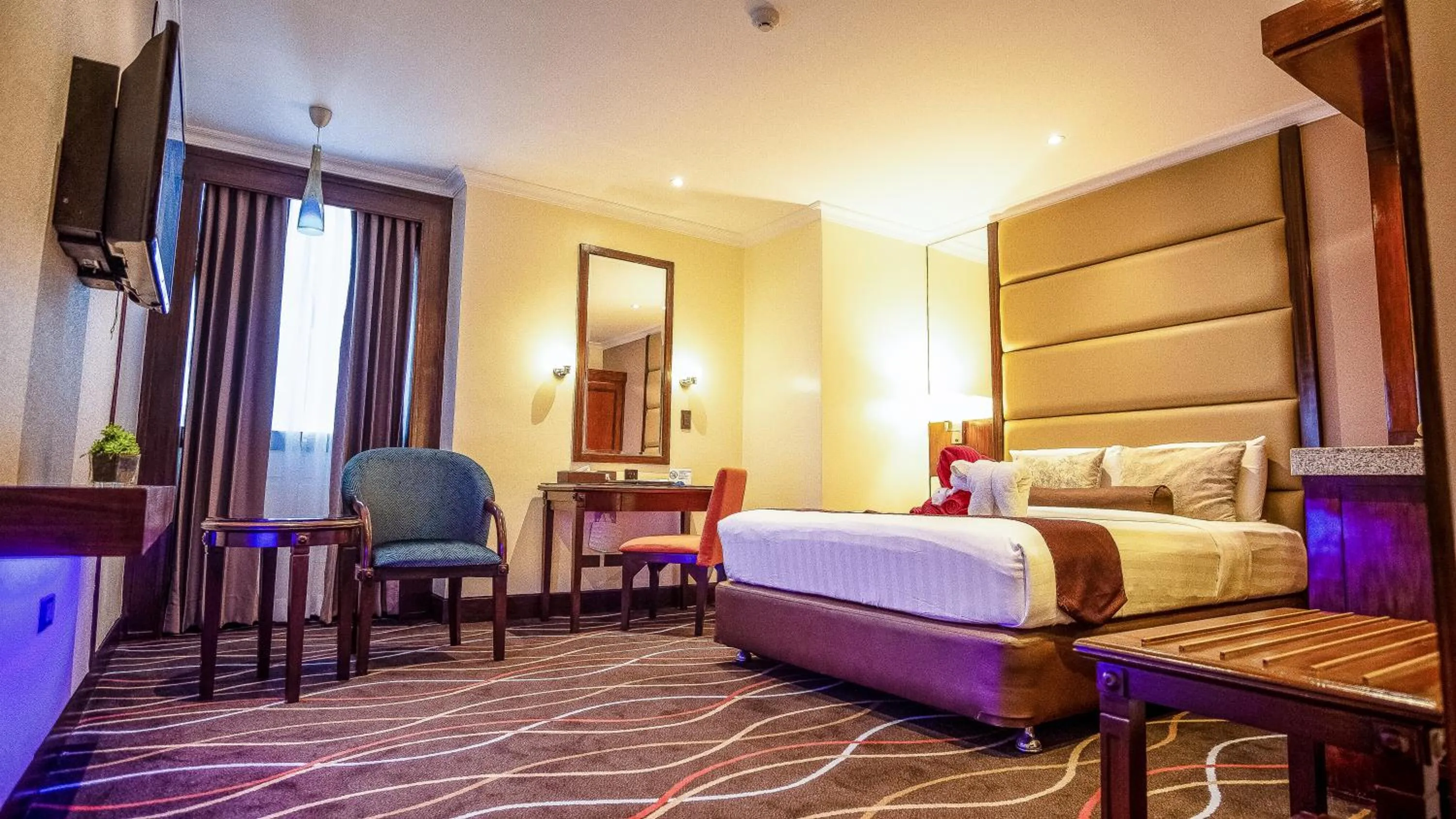 Bed in Cebu Parklane International Hotel