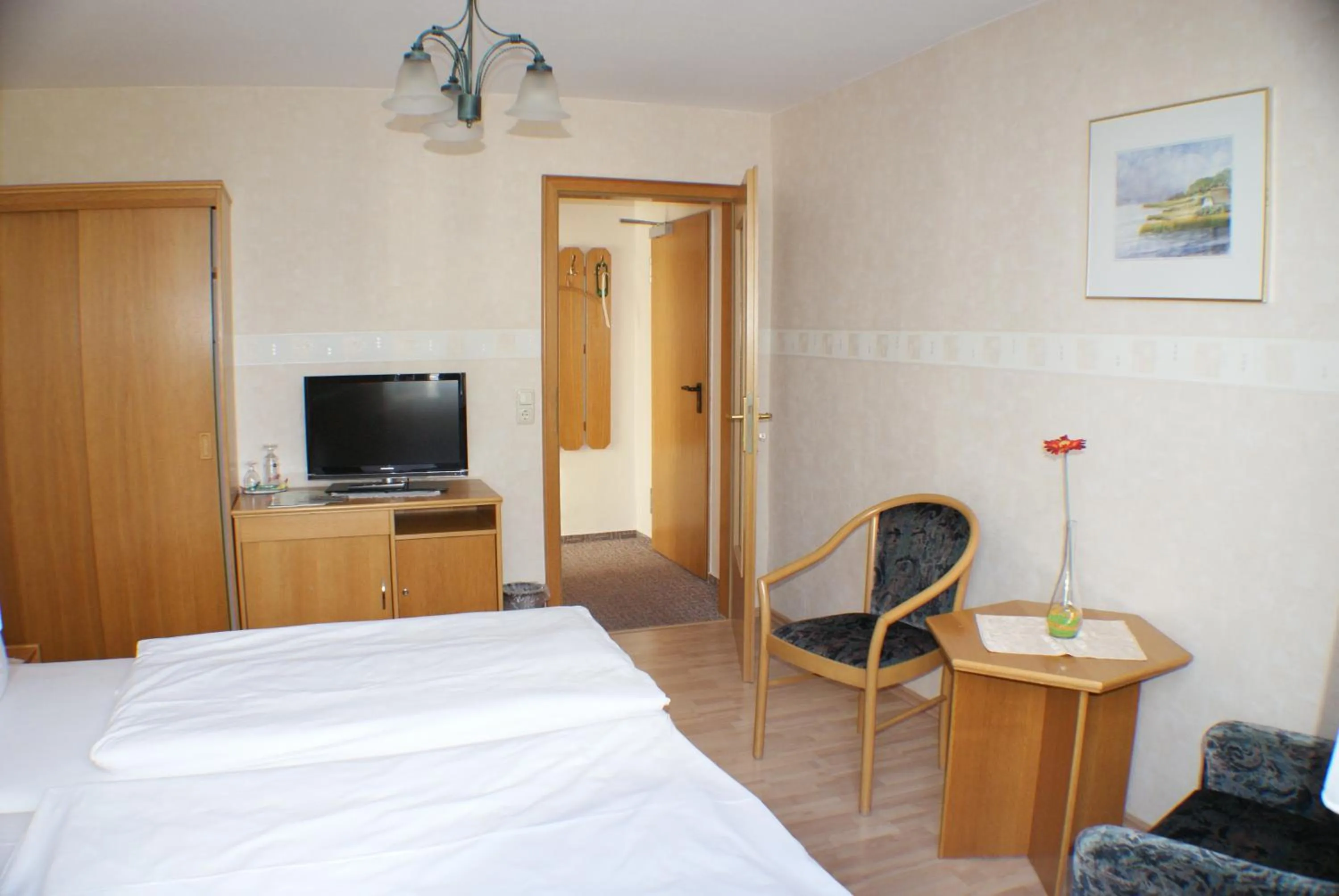 Photo of the whole room, Bed in Kastanienhof Hotel garni