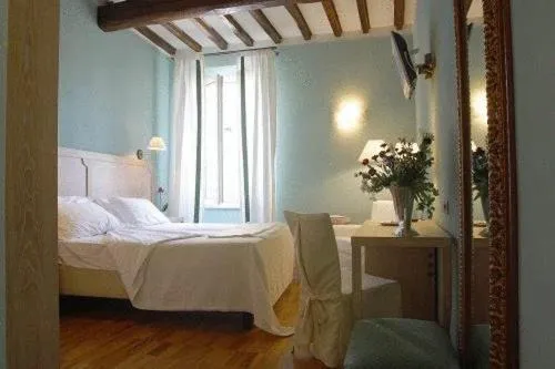 Photo of the whole room, Bed in Albergo Morandi