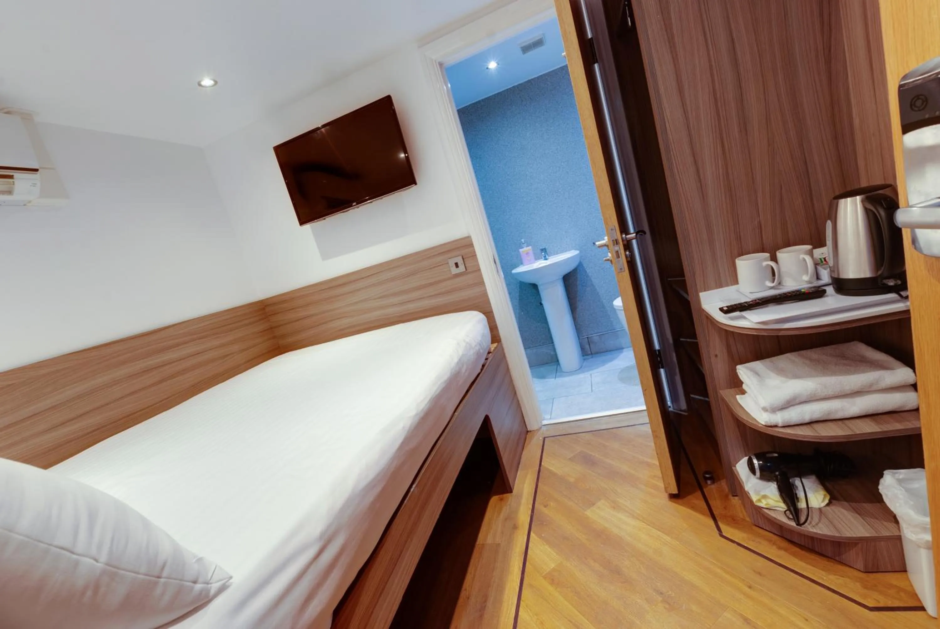 Bed in The Podworks Hotel