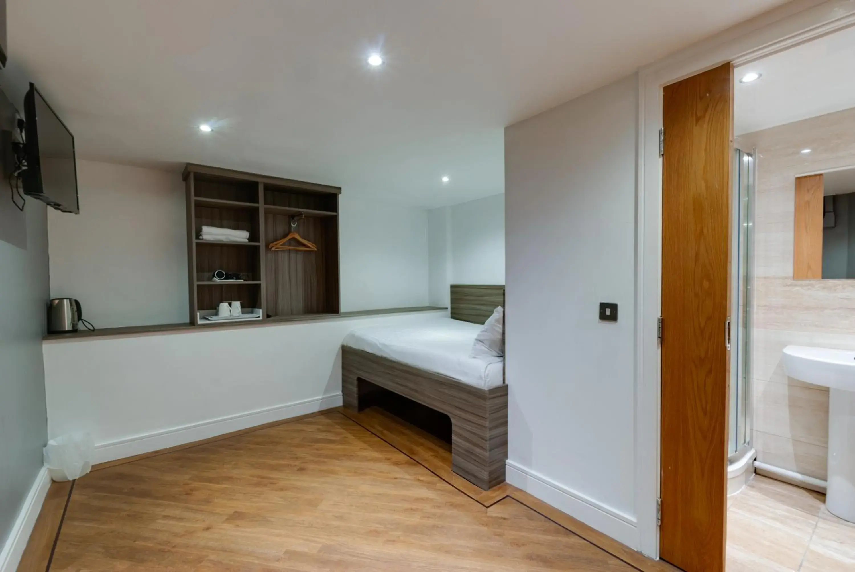 Bed in The Podworks Hotel Bed in The Podworks Hotel